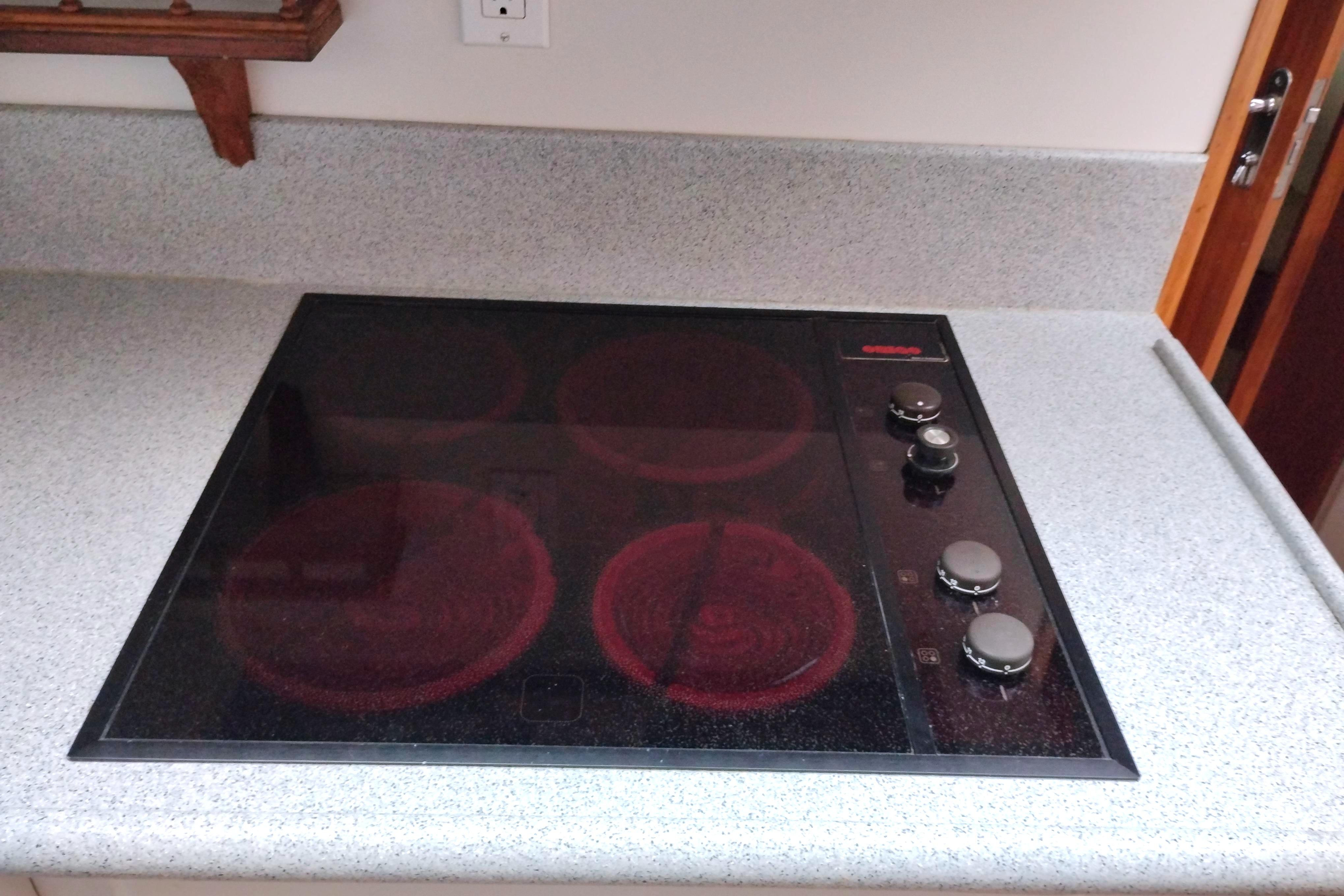 Electric stovetop on a 1991 Californian 52 Cockpit Motor Yacht kitchen counter.