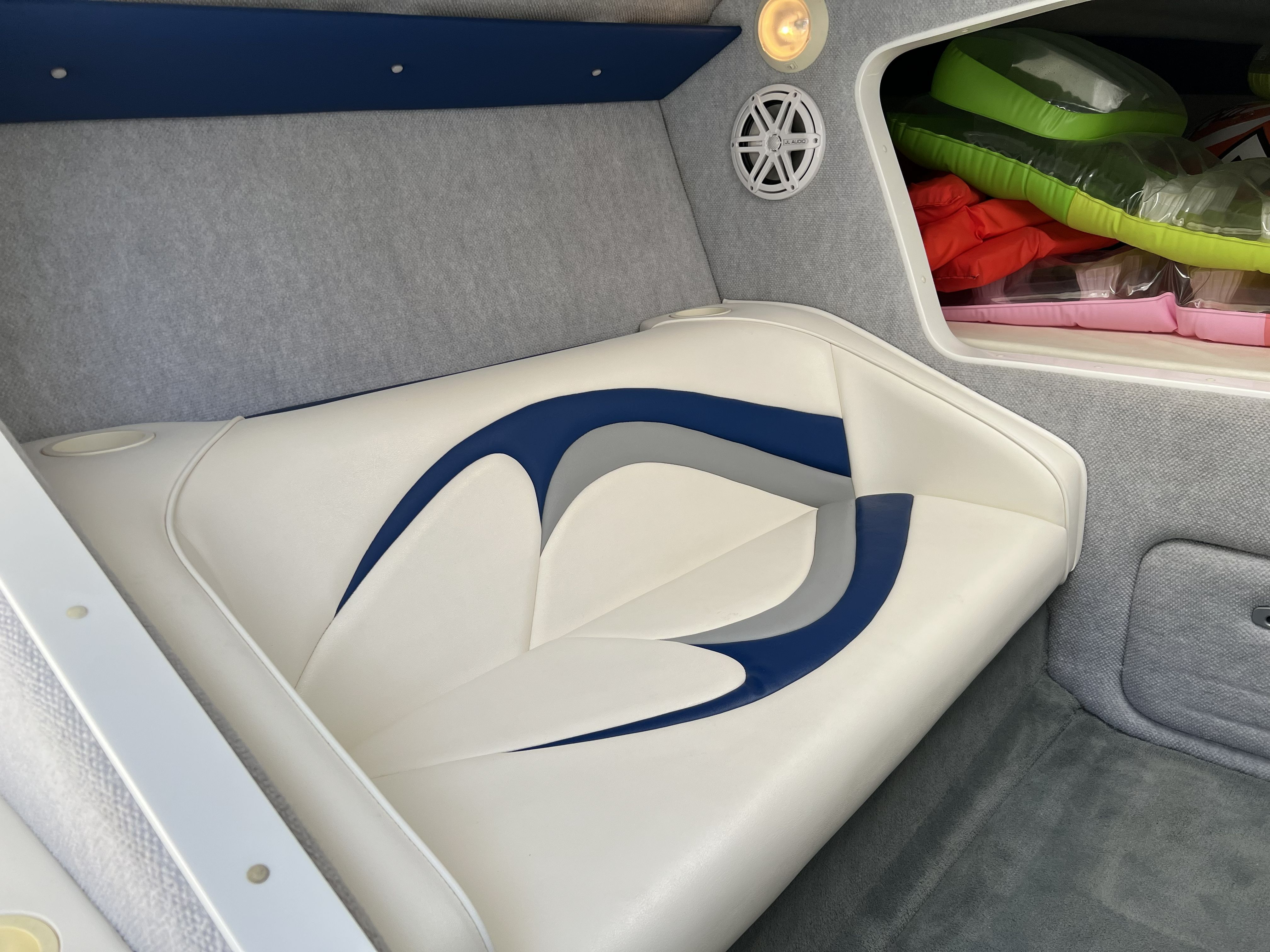 Interior of 2007 Nordic Powerboats Heat with seating and speaker.