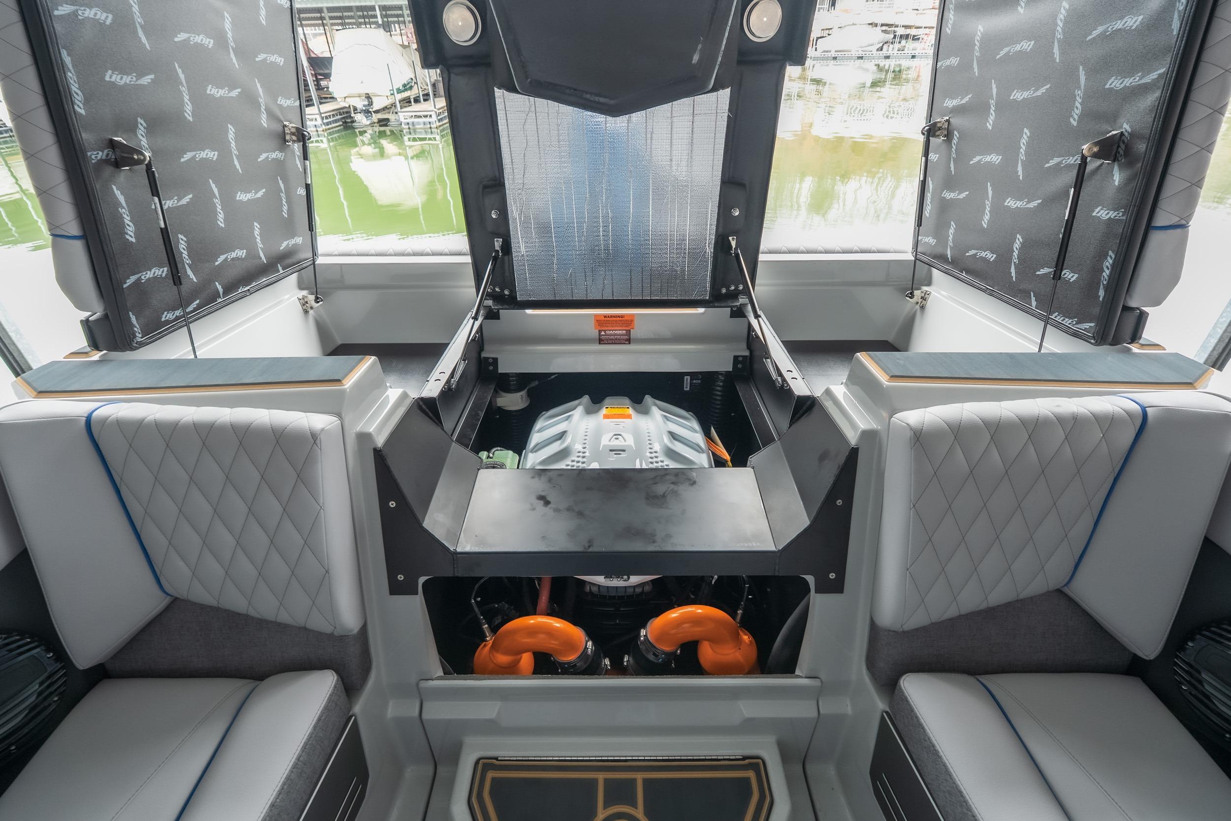 2026 Tigé Z3 boat interior showcasing engine compartment and seating area.