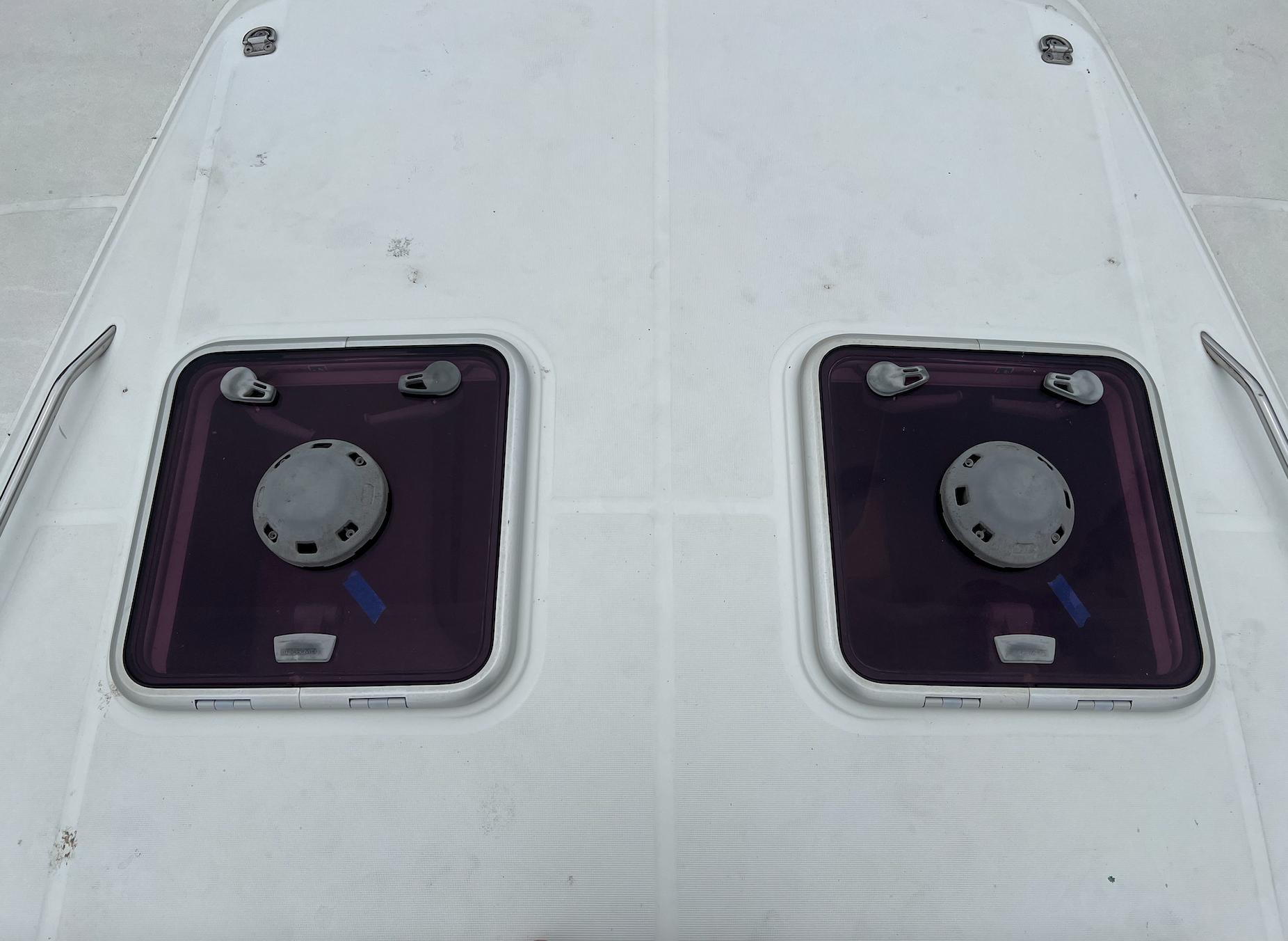 Deck hatches on a 2010 Beneteau Oceanis 54 sailboat.