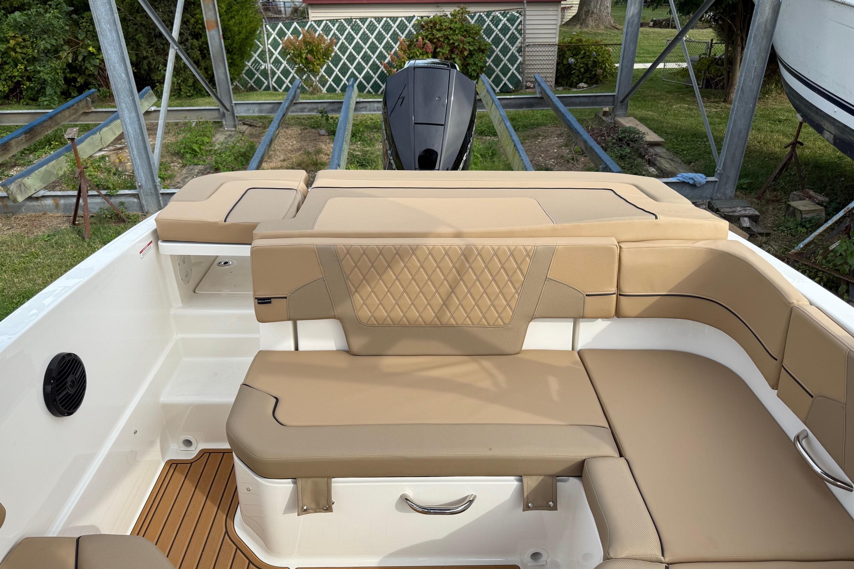 2026 Bayliner VR6 Bowrider OB interior with tan seating and modern design.