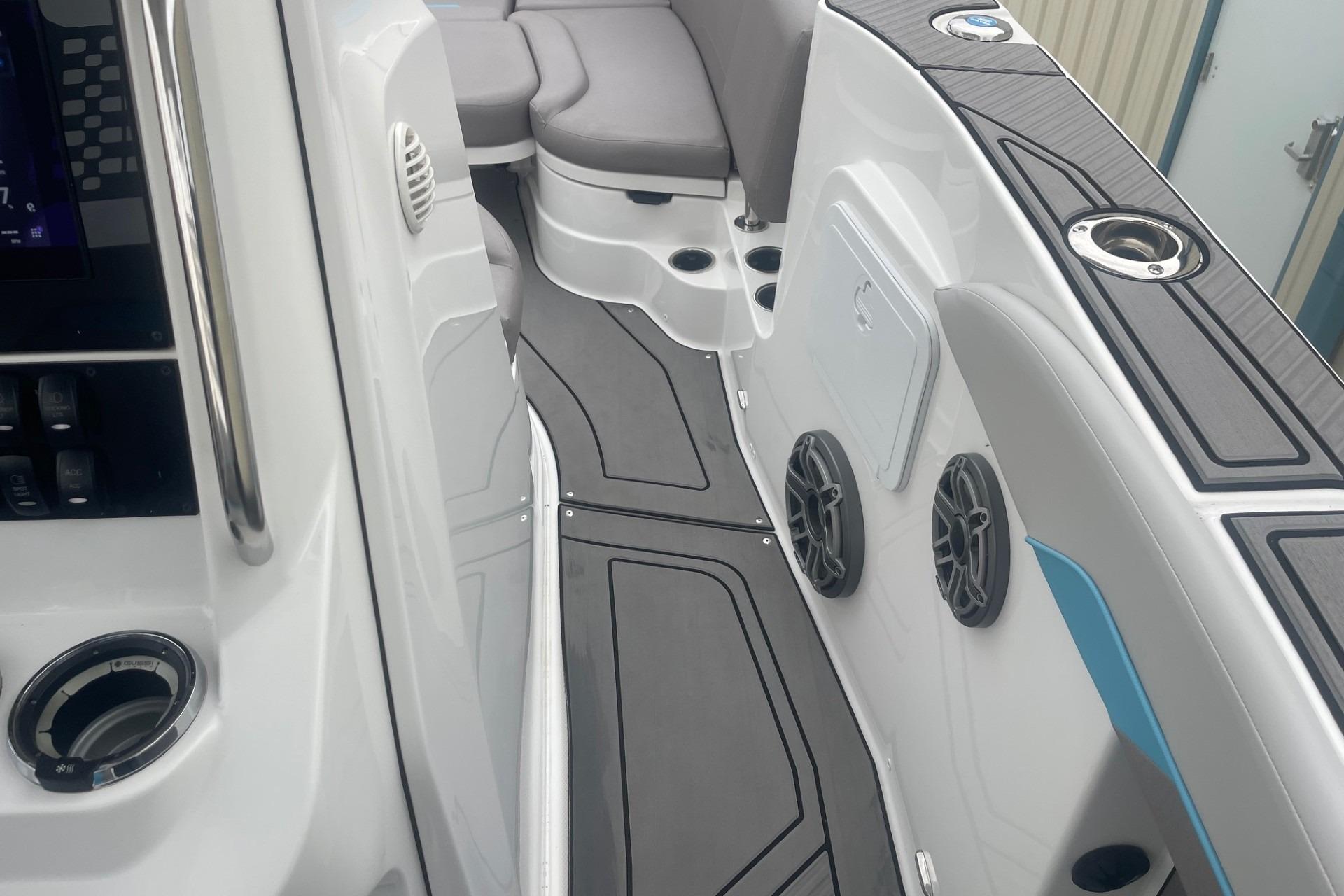 2025 Hurricane Center Console 24 OB boat interior with modern seating and audio system.