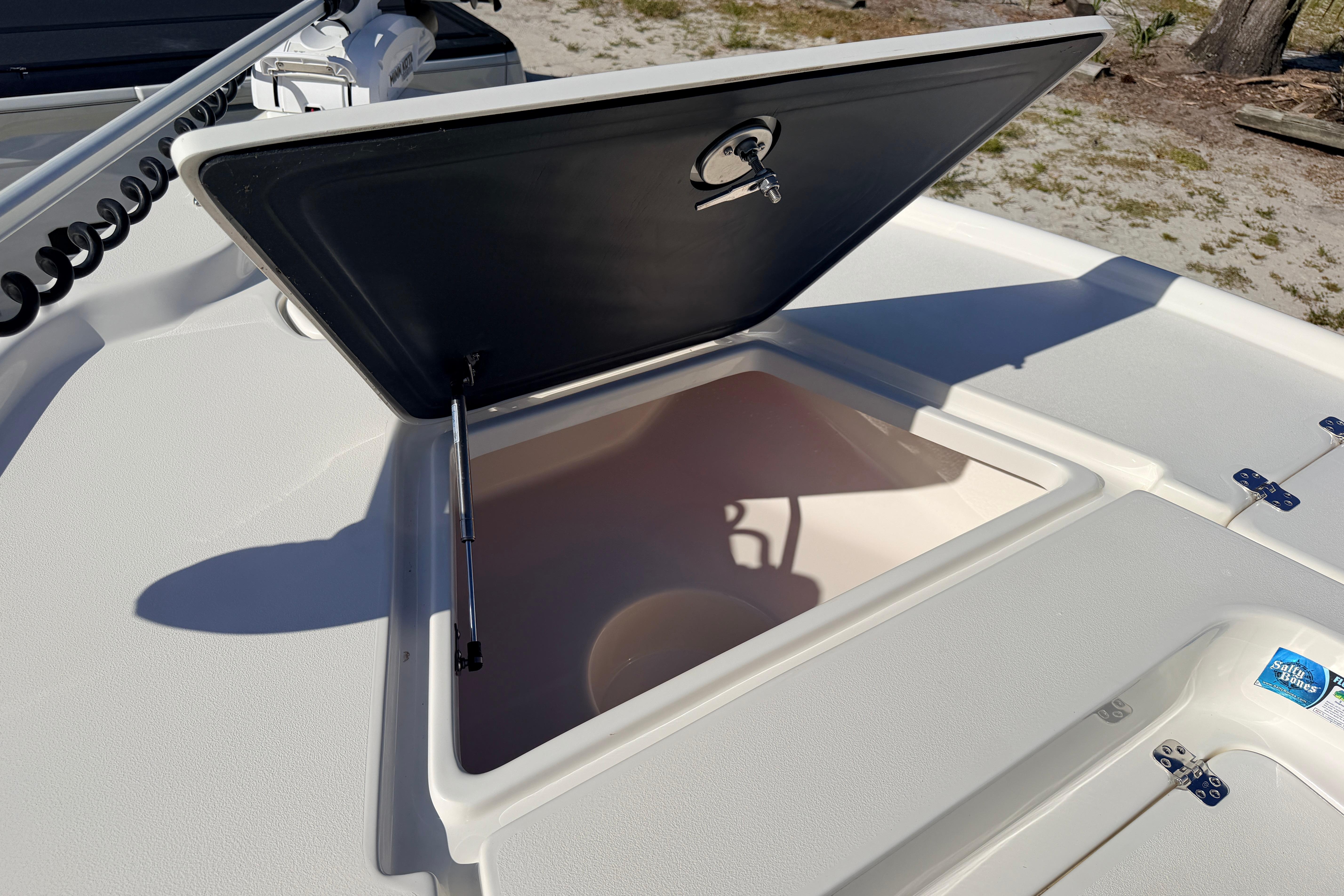 Open storage compartment on 2024 Key West 210 Bay Reef boat deck.