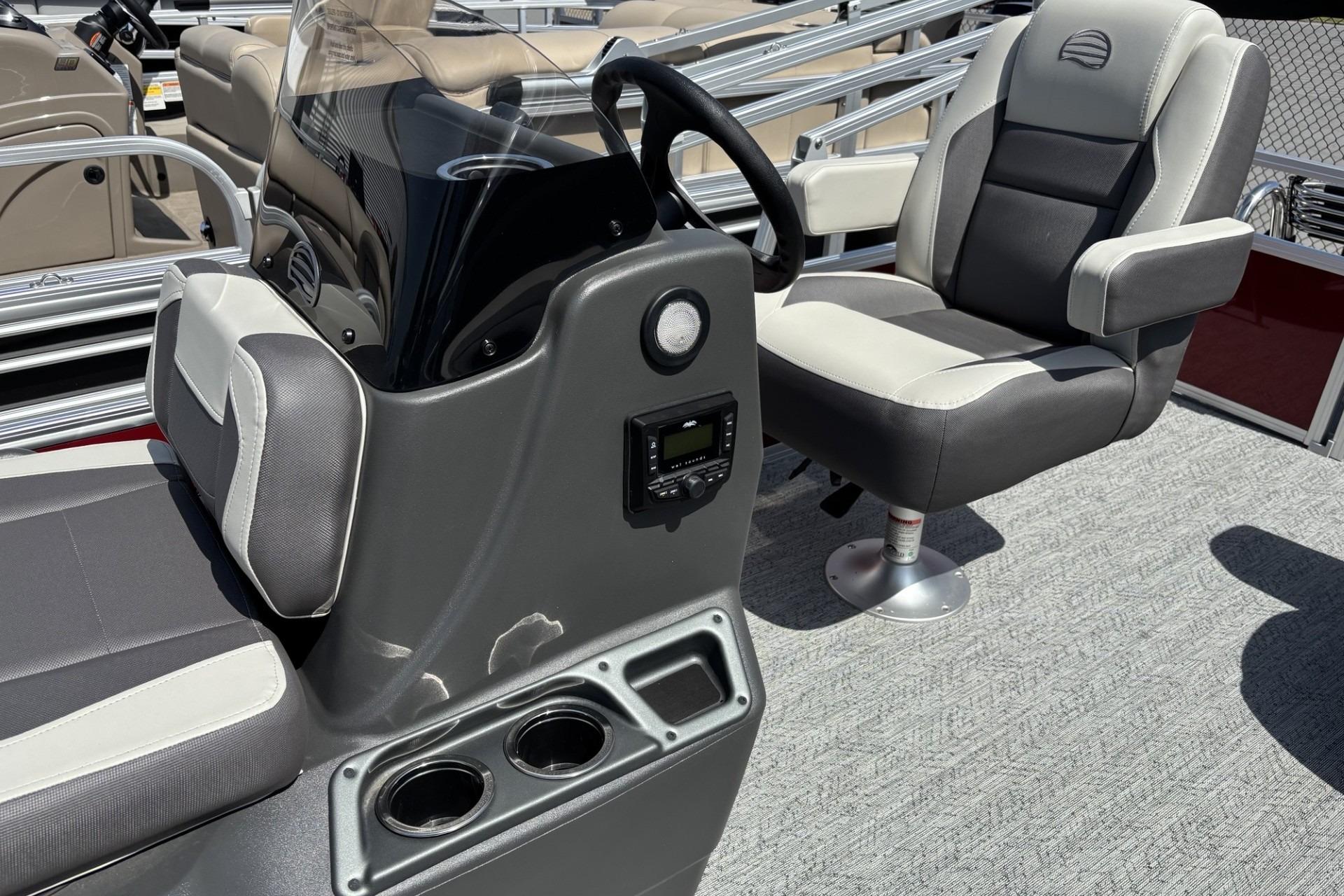 2026 Sun Tracker Bass Buggy 18 DLX interior with steering console and seating.