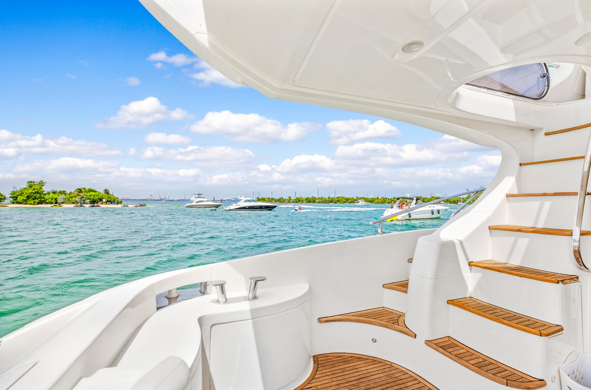 View from 2004 Azimut 62 yacht, overlooking serene waters and distant boats.