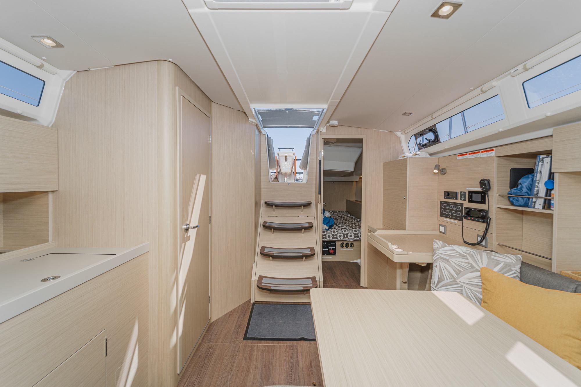 2025 Beneteau Oceanis 37.1 yacht interior with modern design and light wood finish.