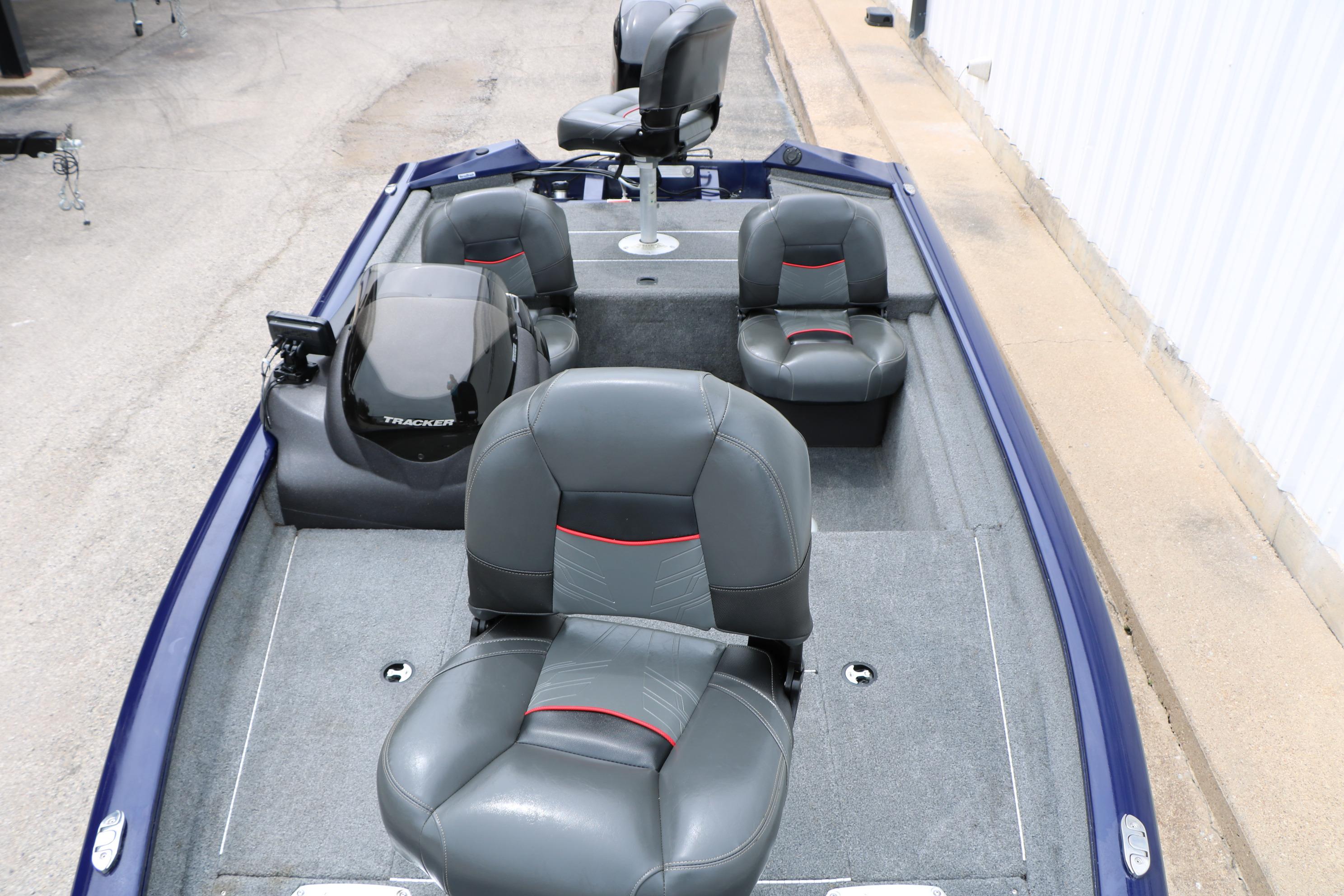 2022 Tracker Pro Team 175 TF boat interior with gray seating and motor.
