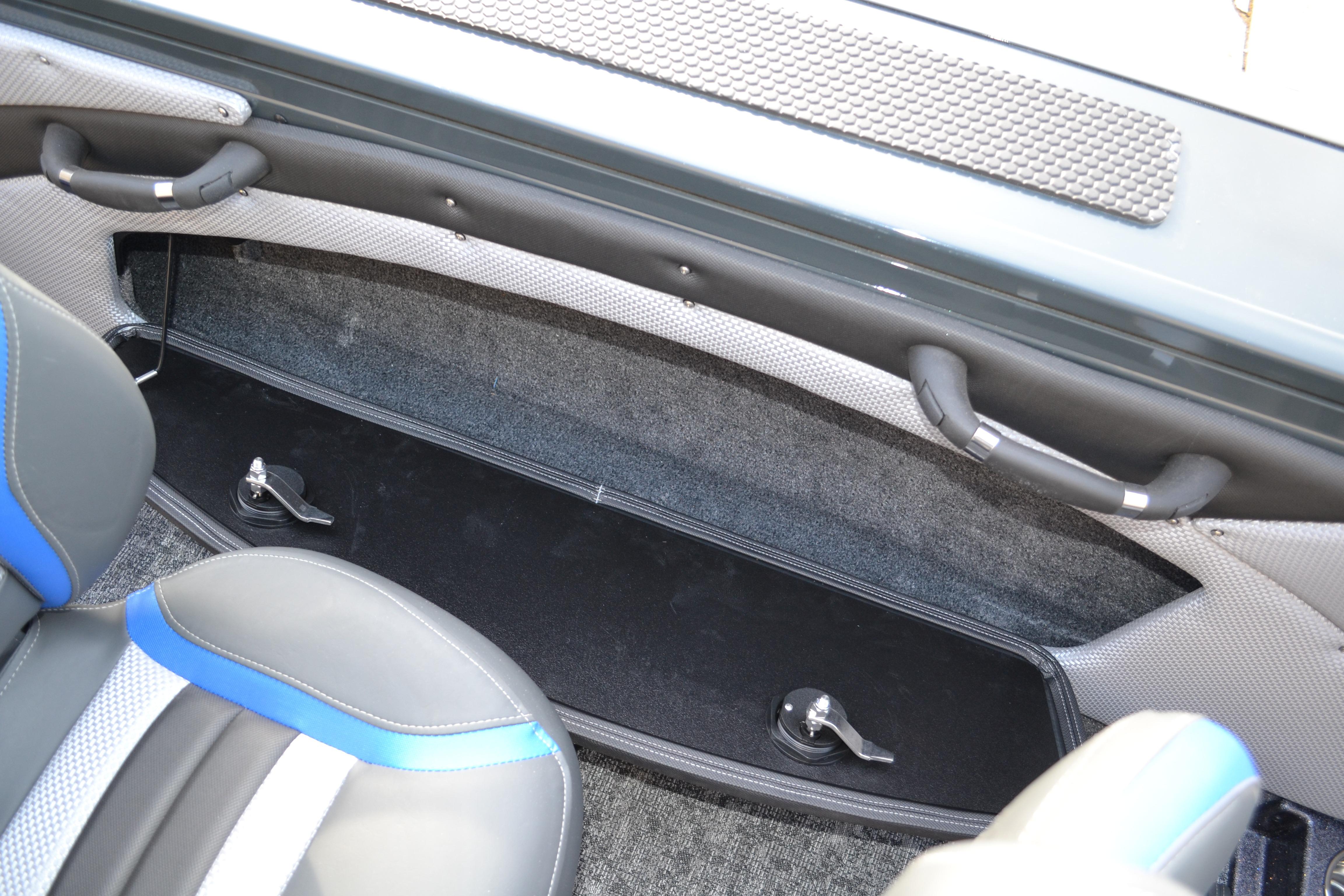 Interior of 2026 Ranger VX1888 WT boat, featuring sleek seating and storage compartment.