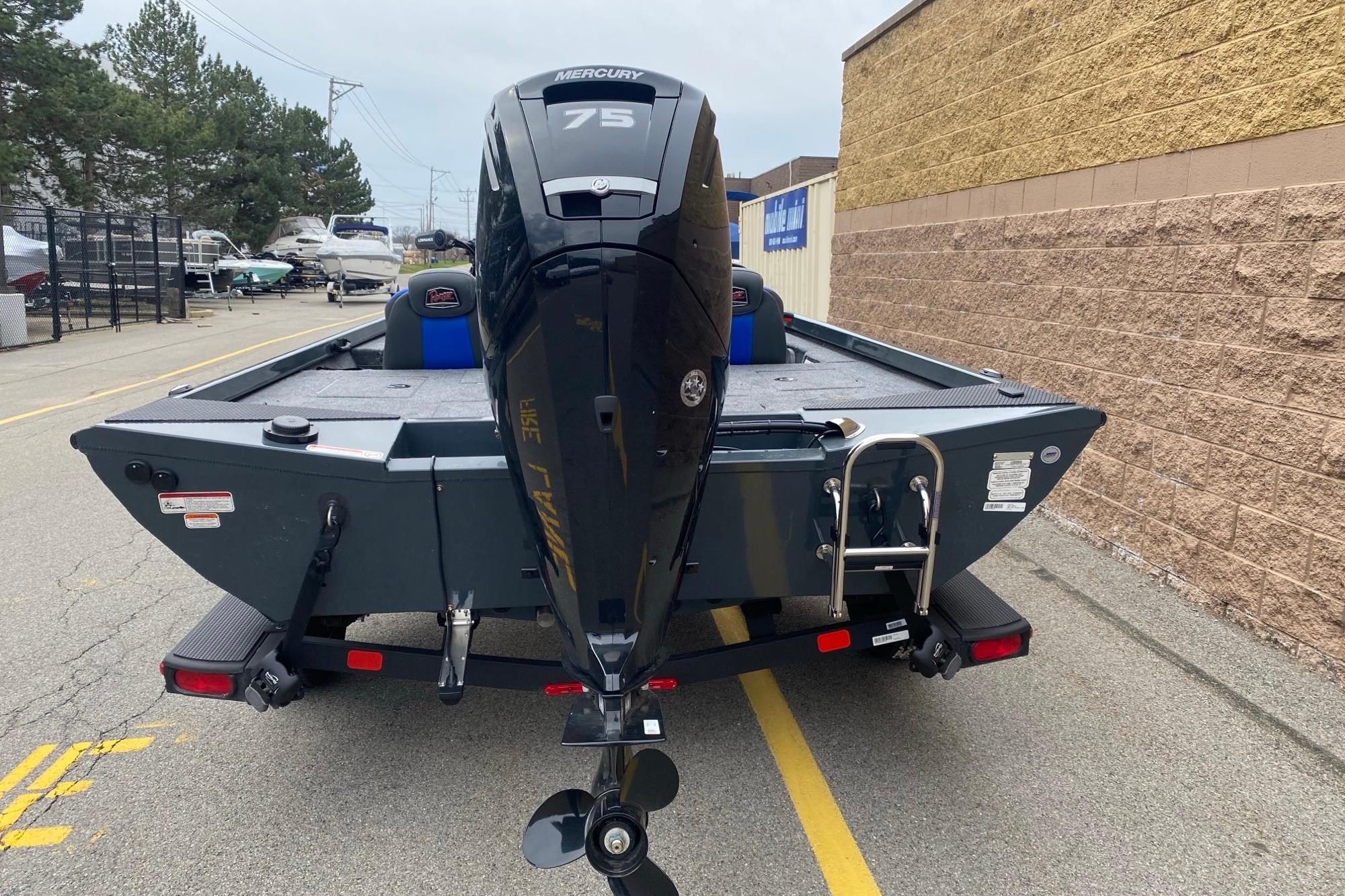 2026 Ranger RT178 boat with Mercury 75 engine on trailer, parked outdoors.