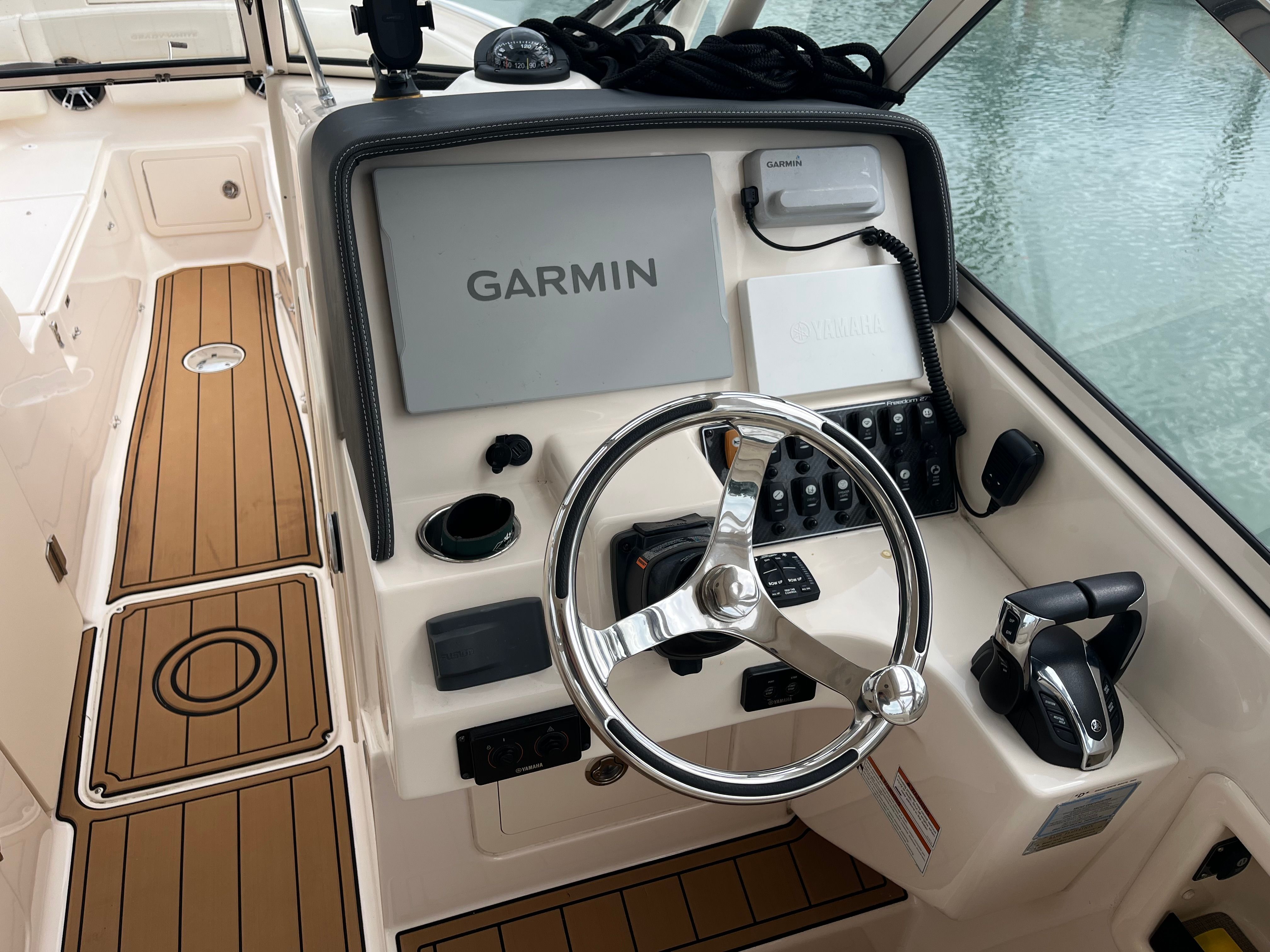 Grady-White Freedom 275 helm with Garmin navigation, 2022 model.
