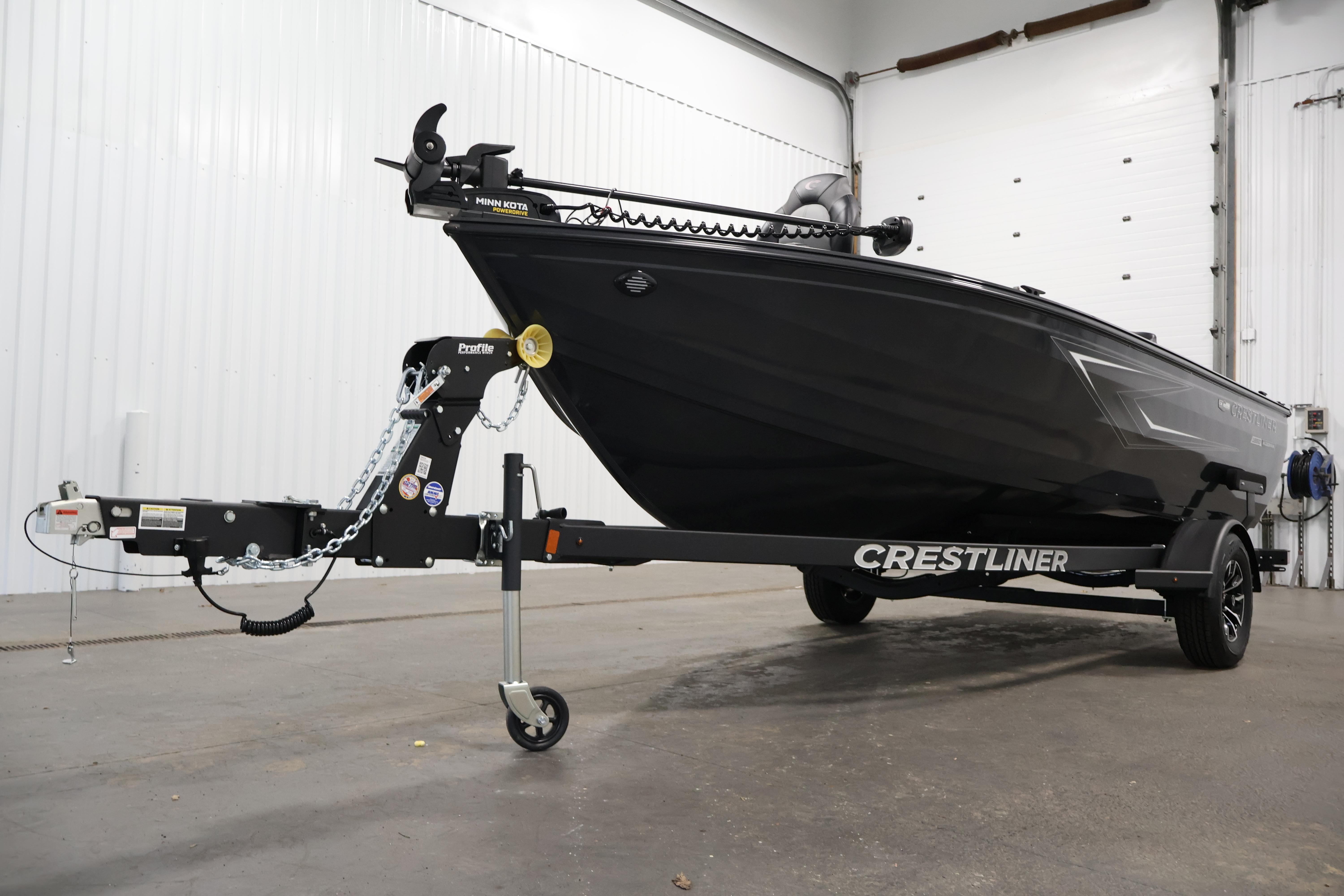 2026 Crestliner 1850 Kodiak SC boat on trailer in indoor setting.