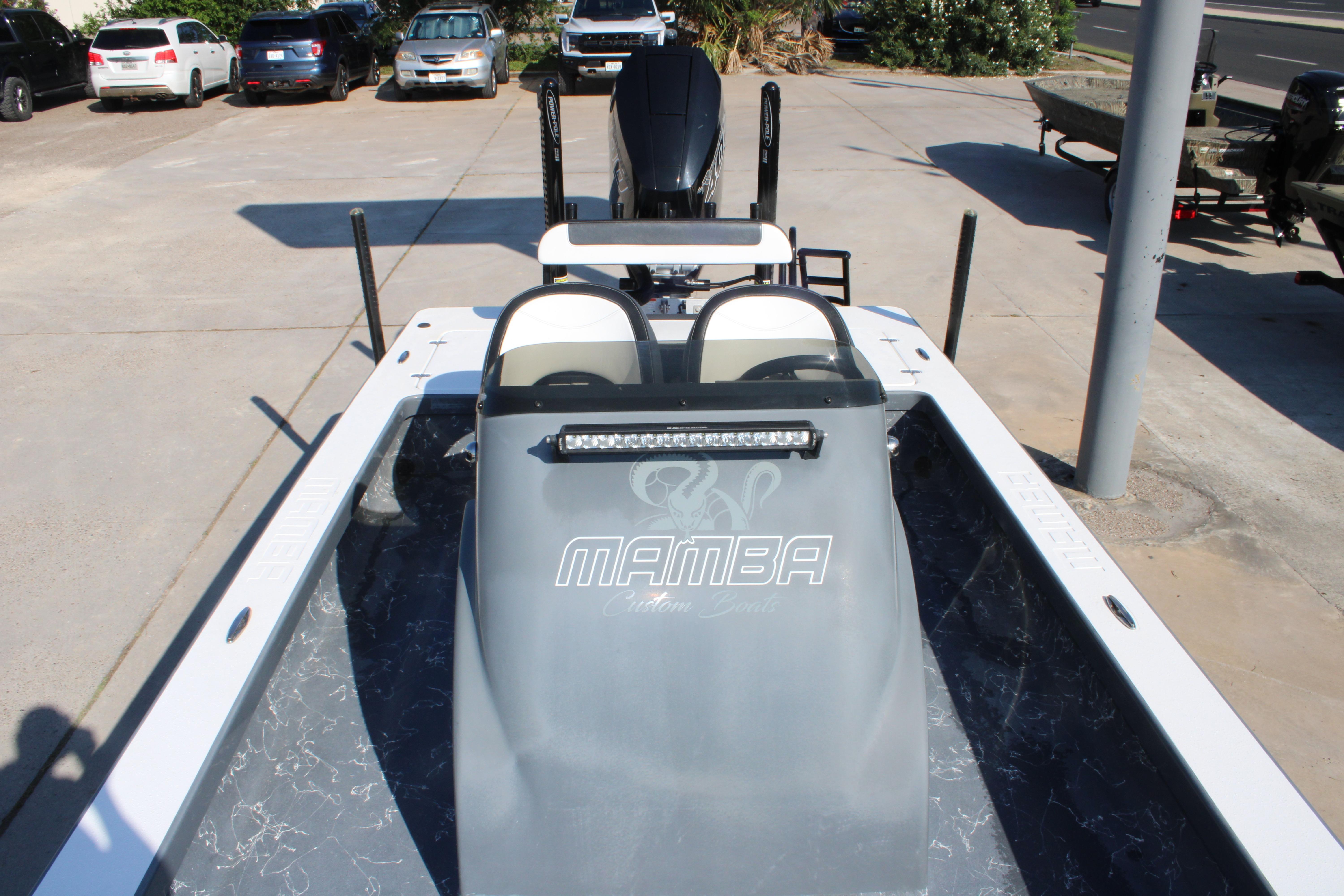 2023 Mamba 24VX boat with sleek design and modern features, parked outdoors.