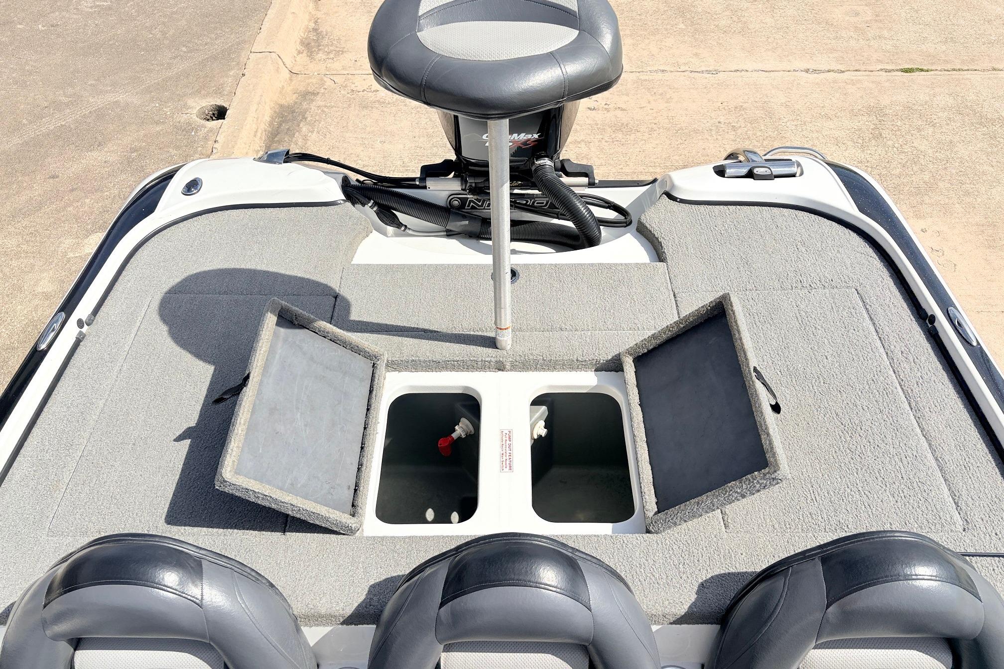 2011 Nitro Z-7 boat deck with open storage compartments and seating.