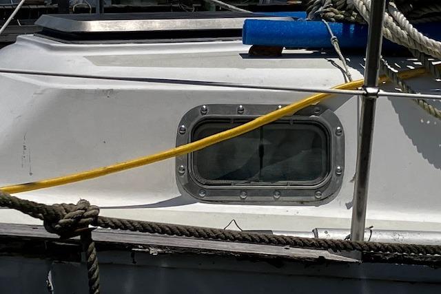 1979 Pearson 365 Ketch sailboat with ropes and porthole detail.