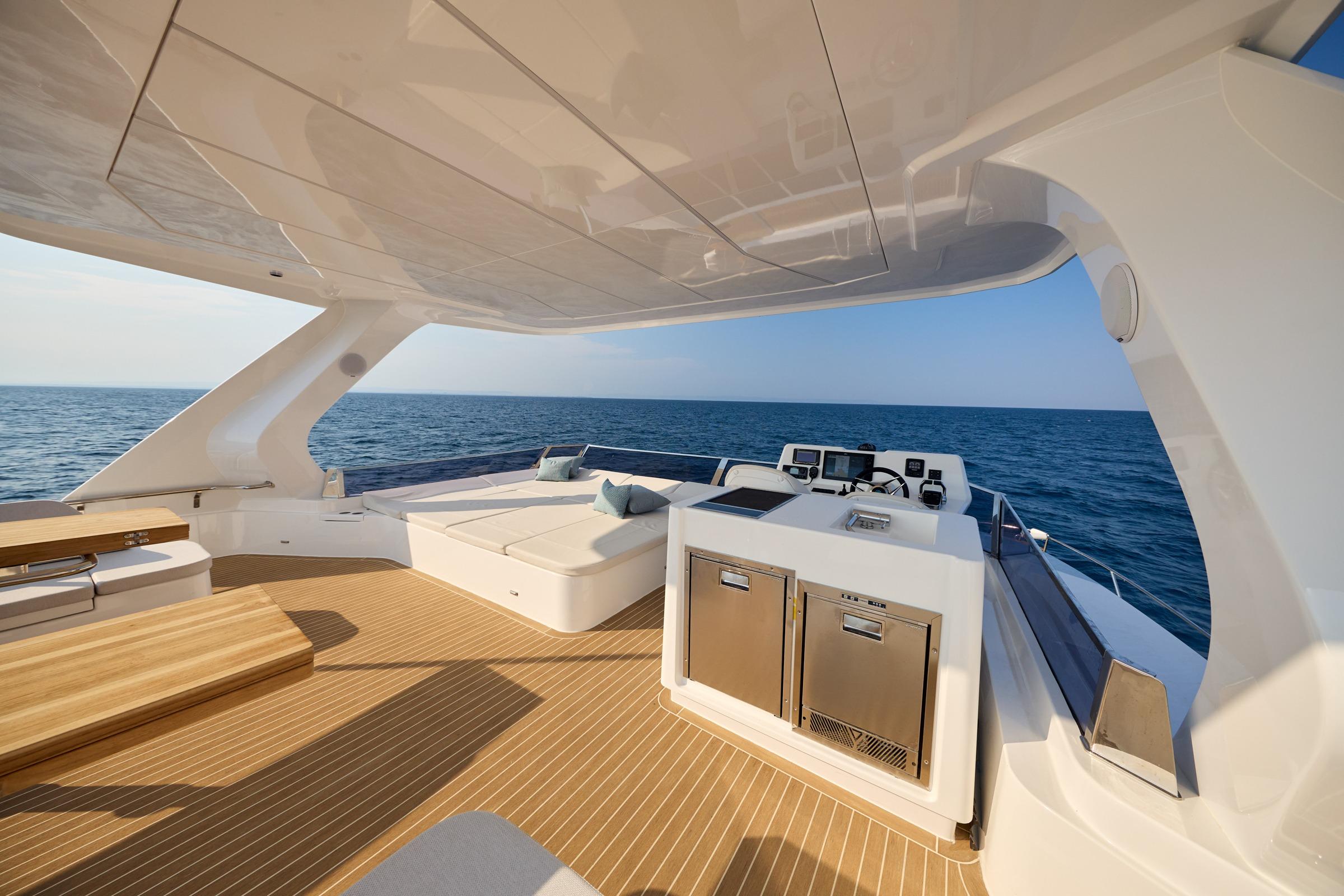 Luxurious 2025 Omaya 50 Power Catamaran with spacious deck and modern amenities at sea.