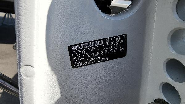 Suzuki DF300AP engine label on a 2022 Sea Born LX24 Center Console boat.