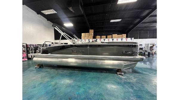 2025 Tahoe Pontoon Cascade Cruise Rear Bench in showroom, side view.