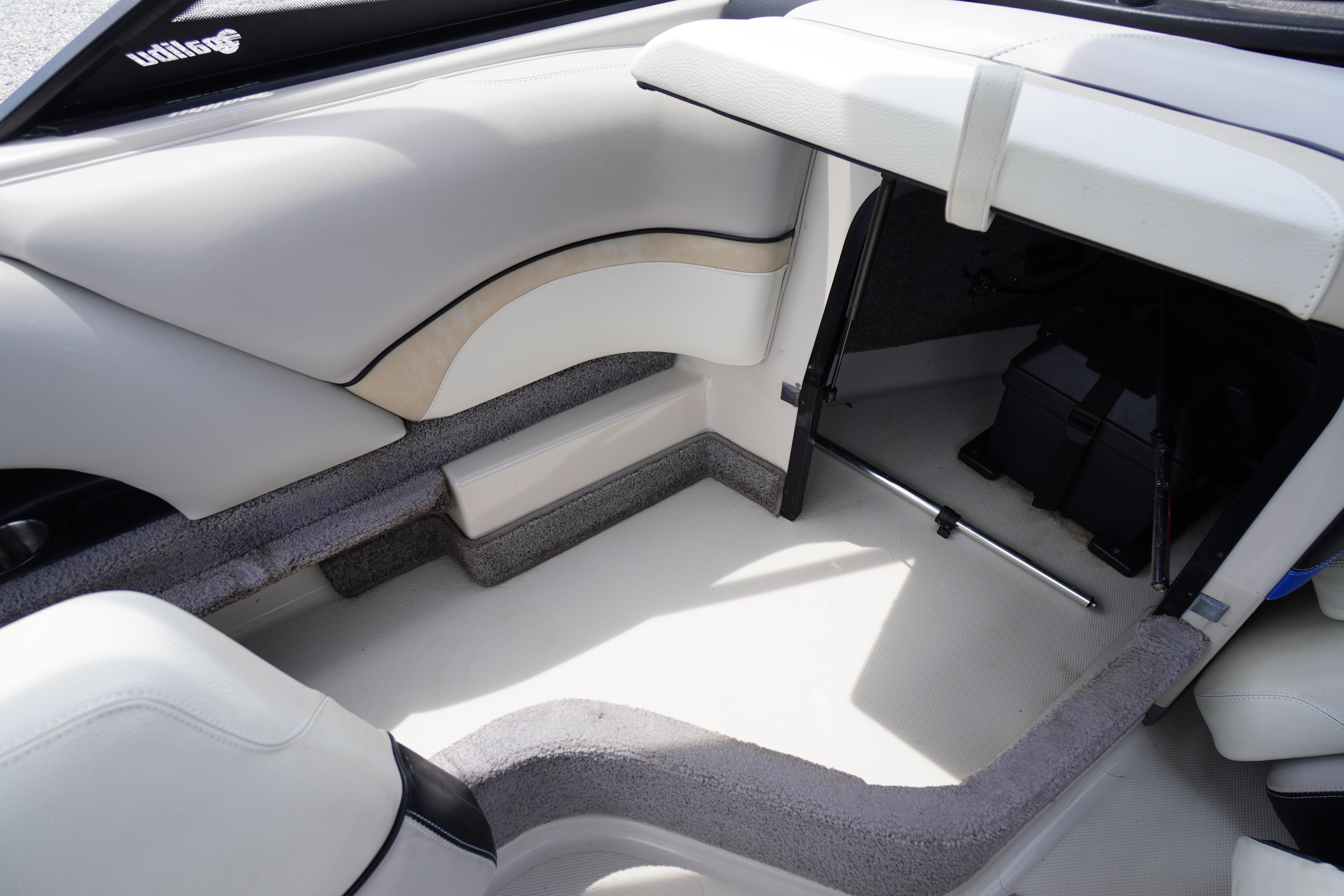 Interior storage compartment of a 2011 Malibu Wakesetter 21 VLX boat.