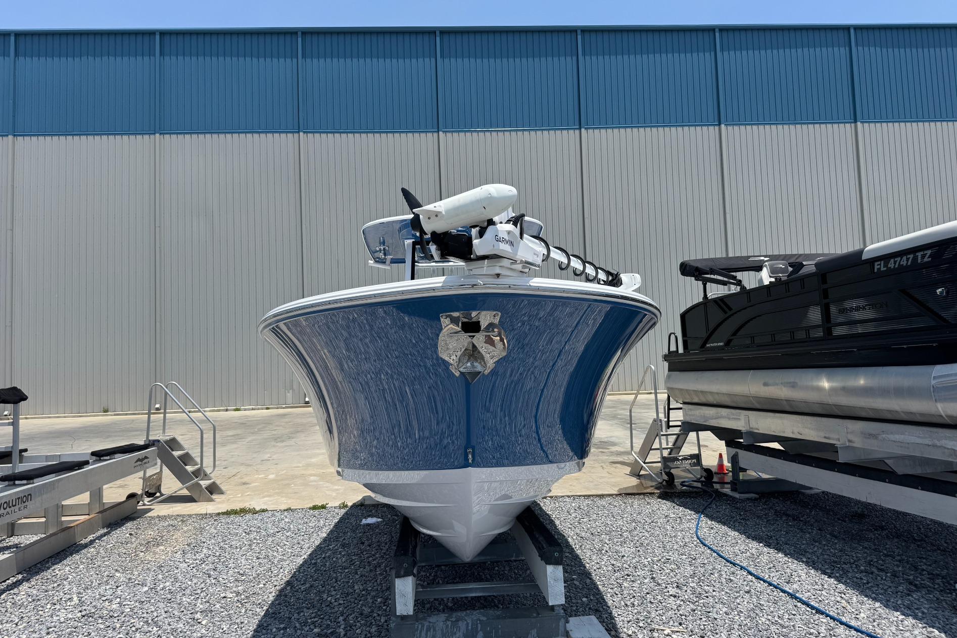2026 Sportsman Open 262 Center Console boat on display outdoors.