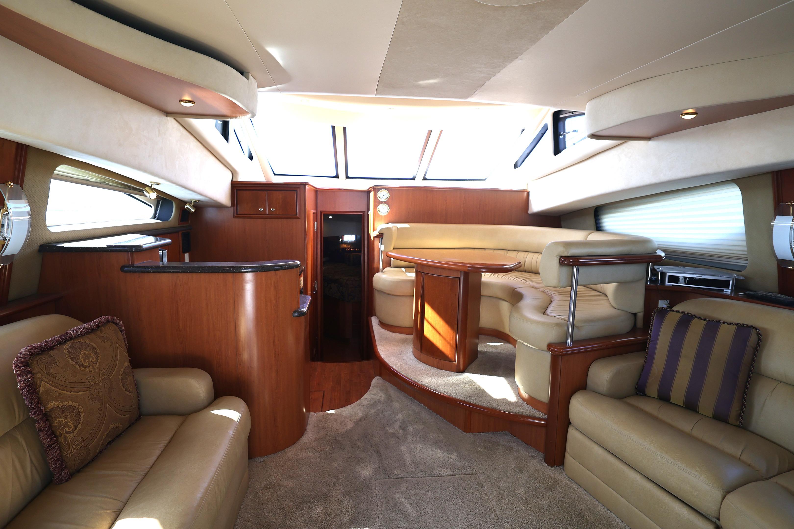 Luxurious interior of 2008 Silverton 43 Sport Bridge yacht with plush seating and elegant design.