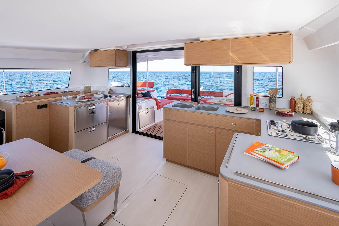 Manufacturer Provided Image: Modern kitchen interior on 2026 Excess 14 yacht with ocean view.