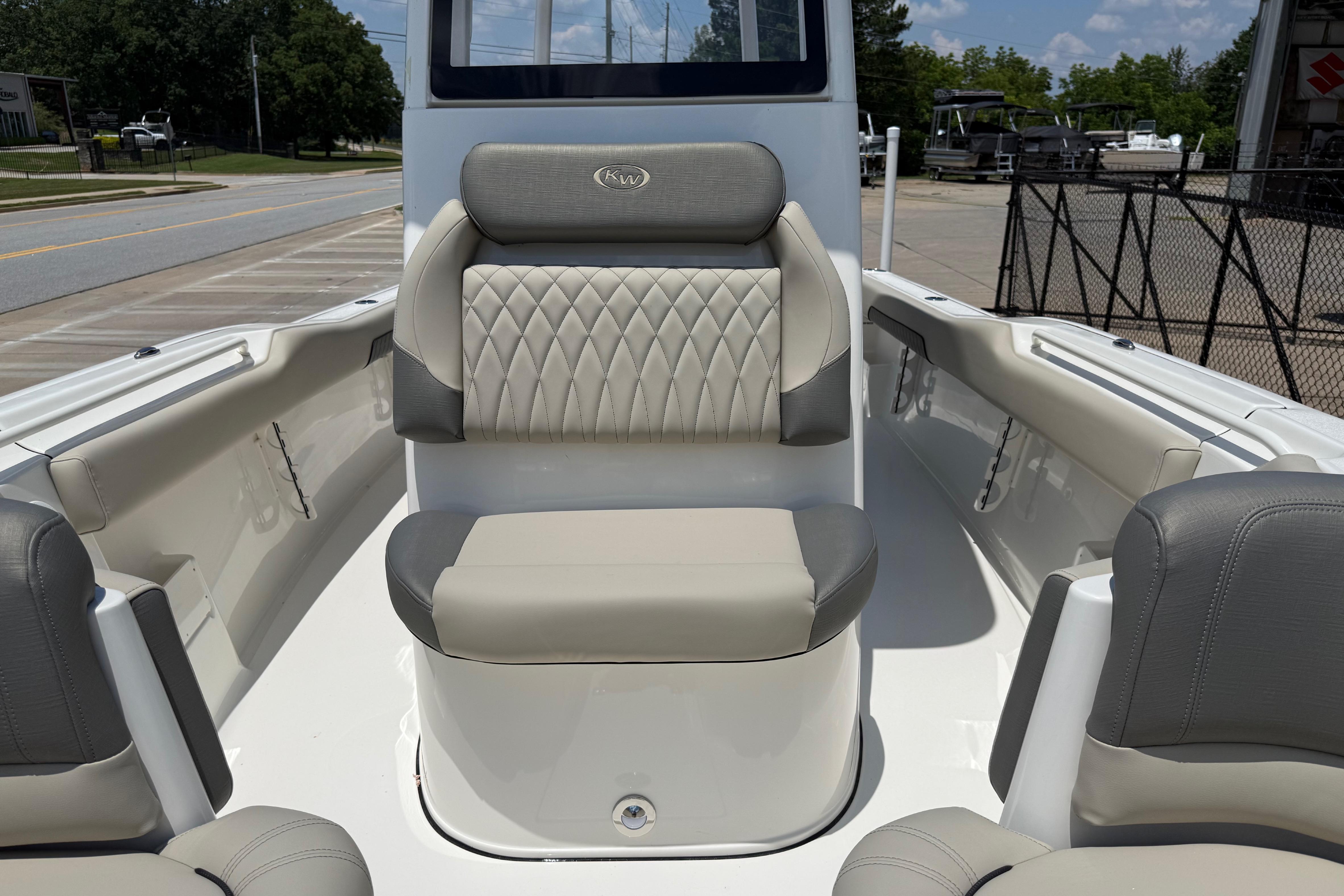 2027 Key West 249 FS boat interior with cushioned seating and sleek design.