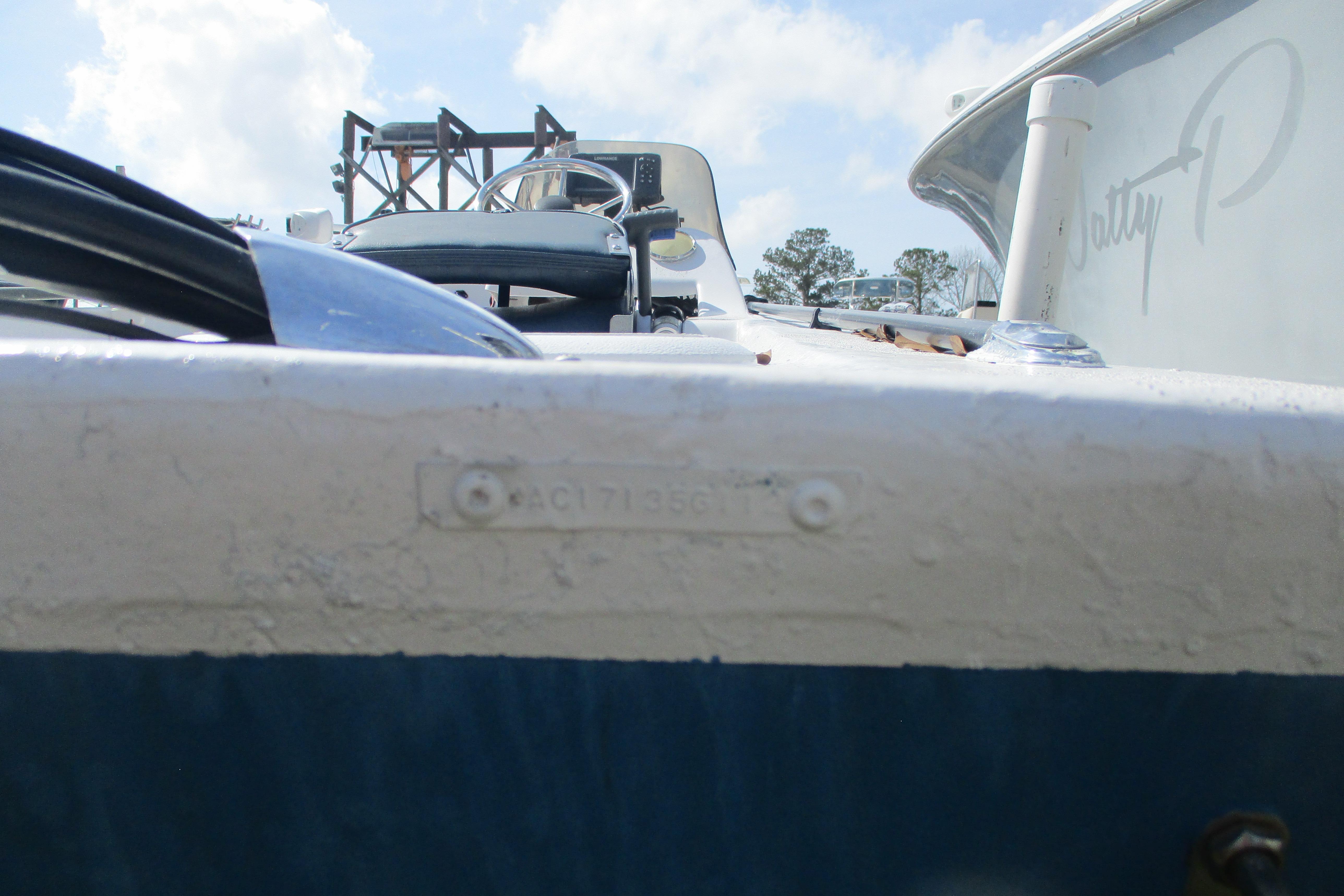 2012 Stumpknocker 17 SPORT boat, close-up view of the deck and steering wheel.