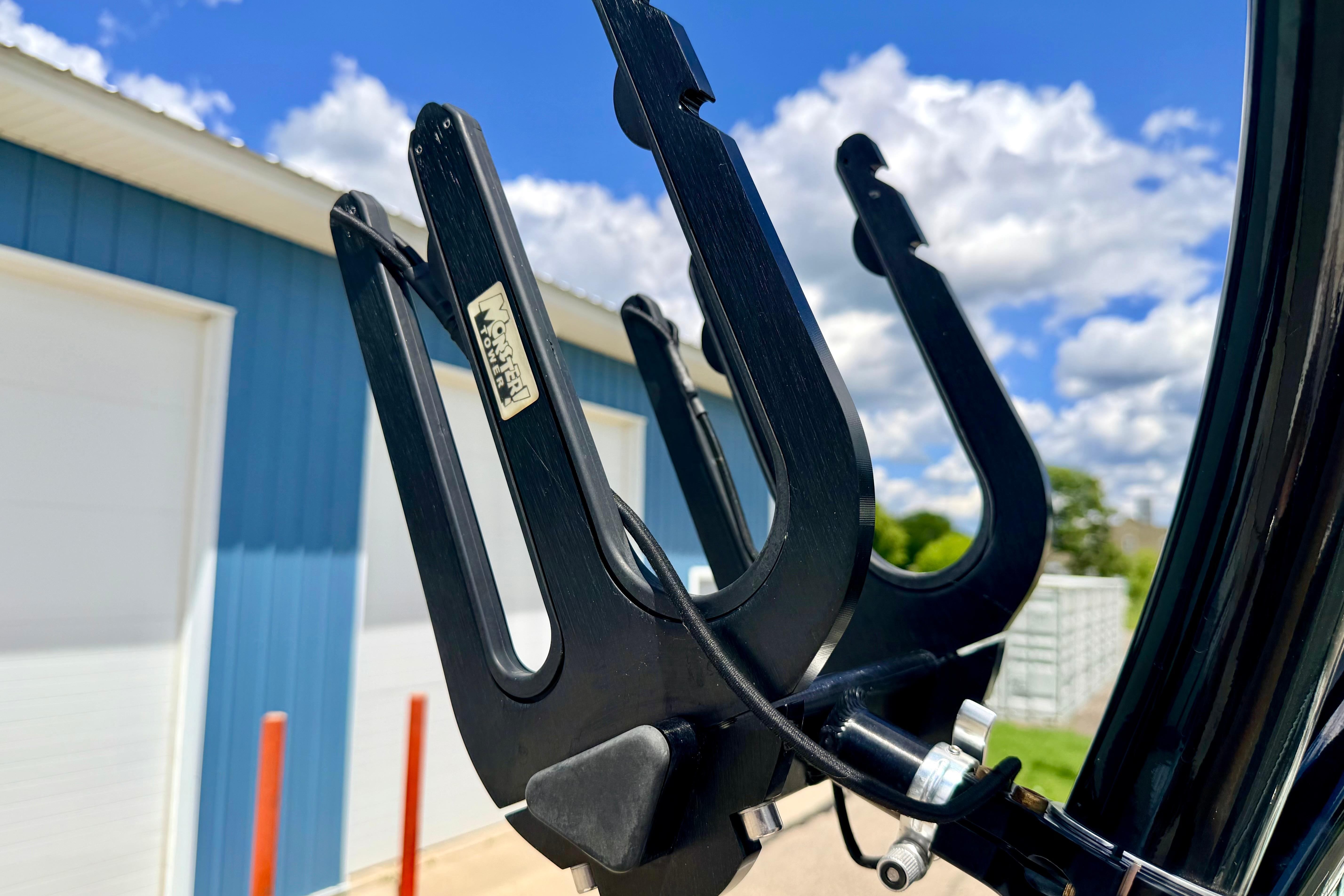 Close-up of a 2015 Chaparral Sunesta 264 boat accessory against a blue sky background.