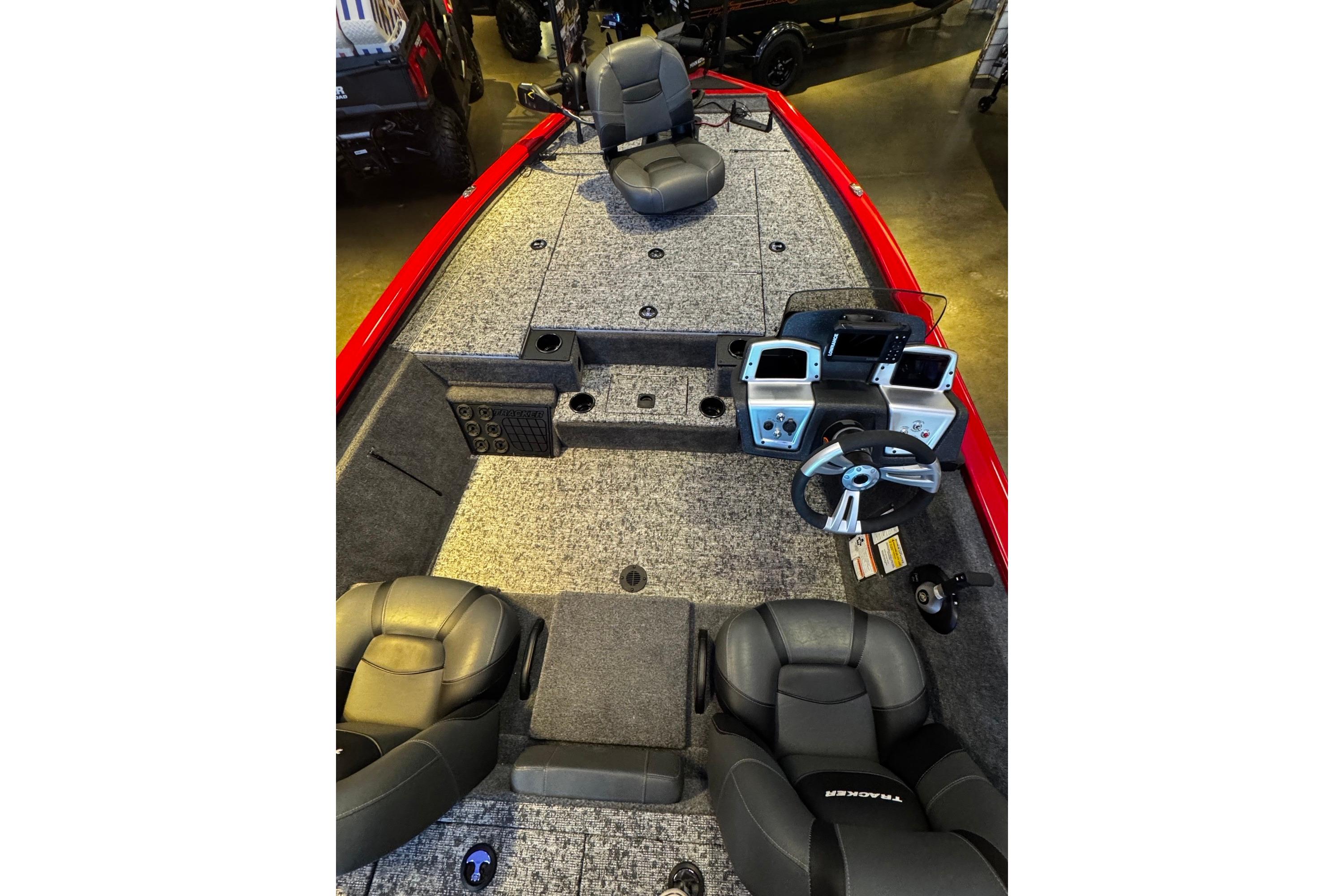 Interior view of 2026 Tracker Pro Team 195 boat with seating and control panel.