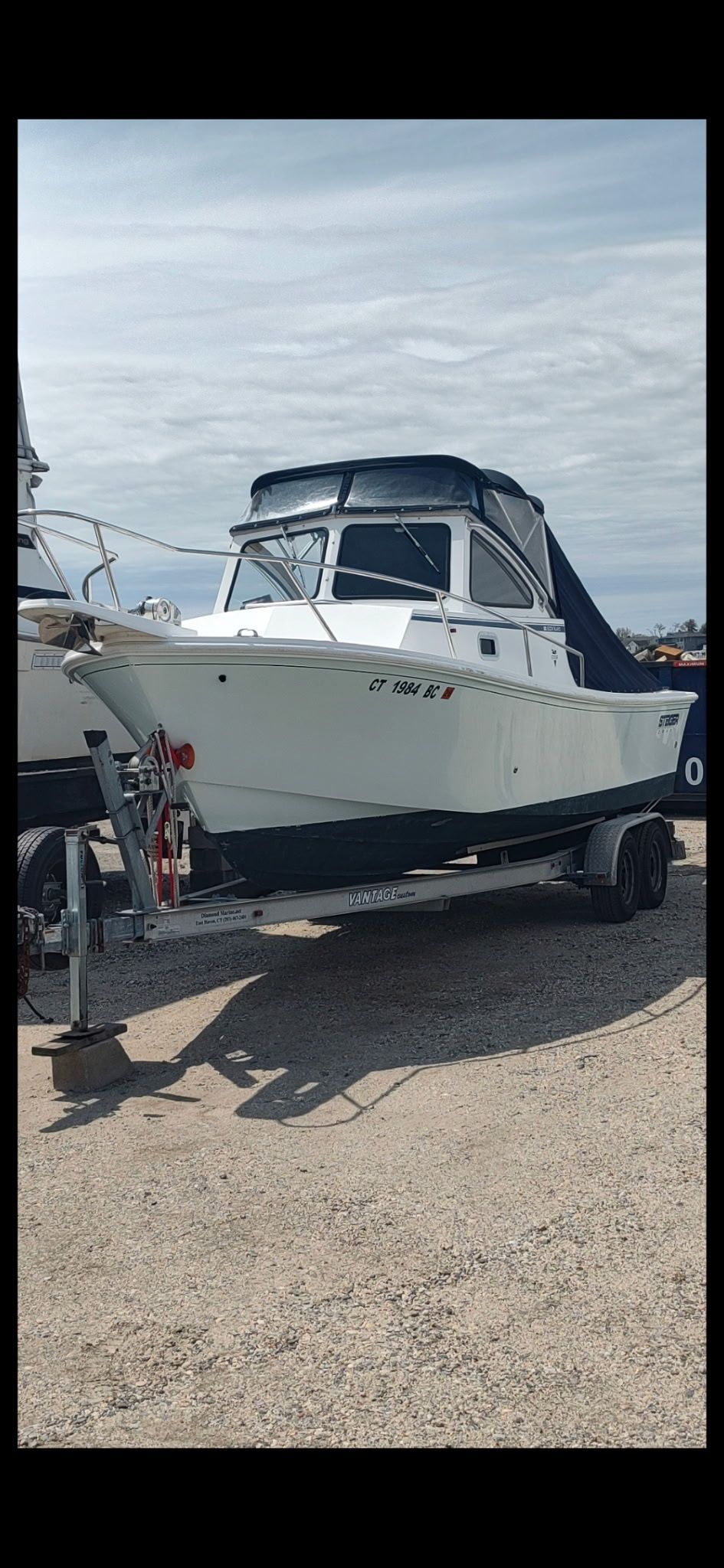 A 2007 Steiger Craft 23 Tournament boat is on a trailer on land.