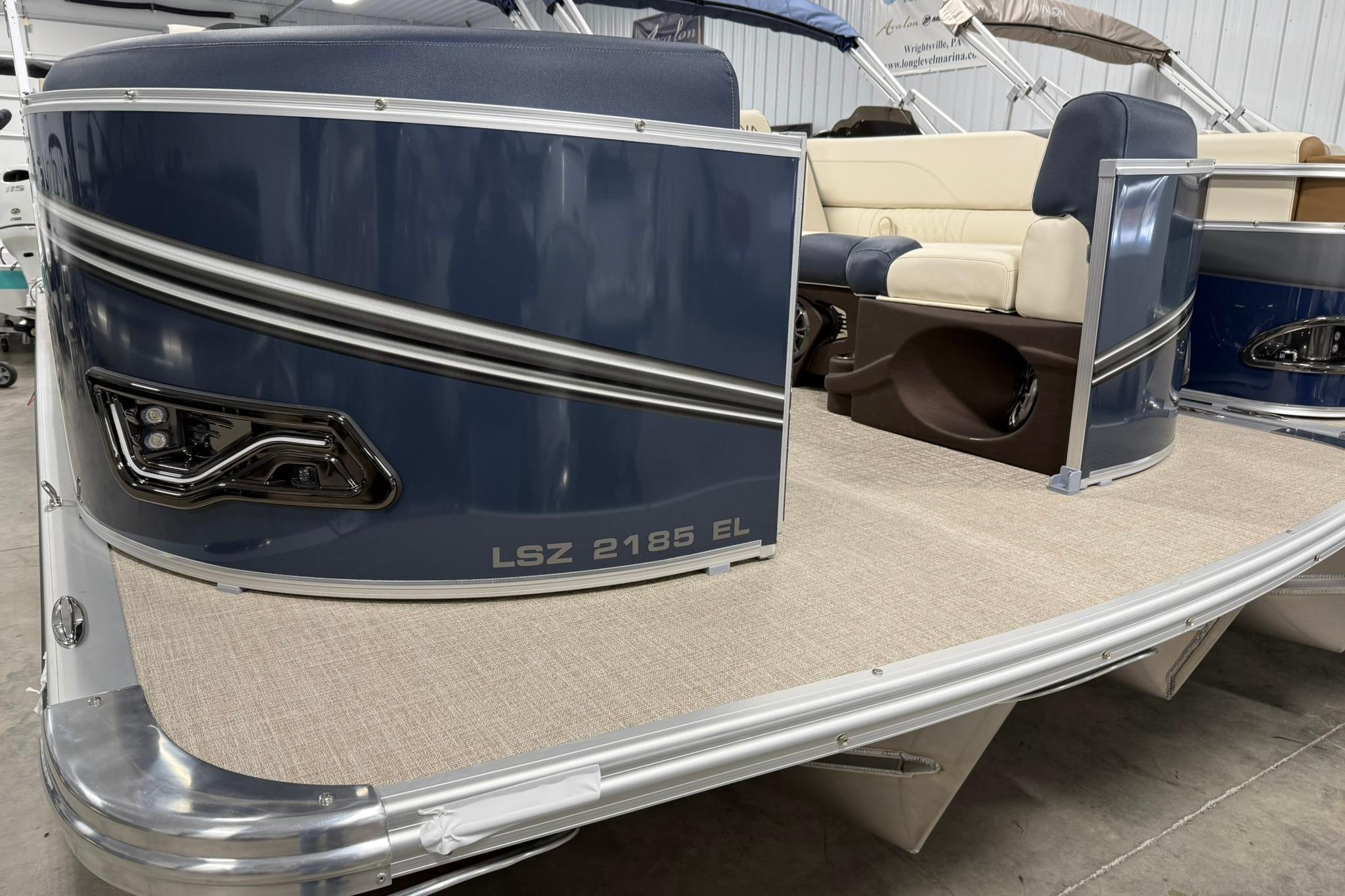 2026 Avalon LSZ Elite 21' pontoon boat with sleek design and comfortable seating.