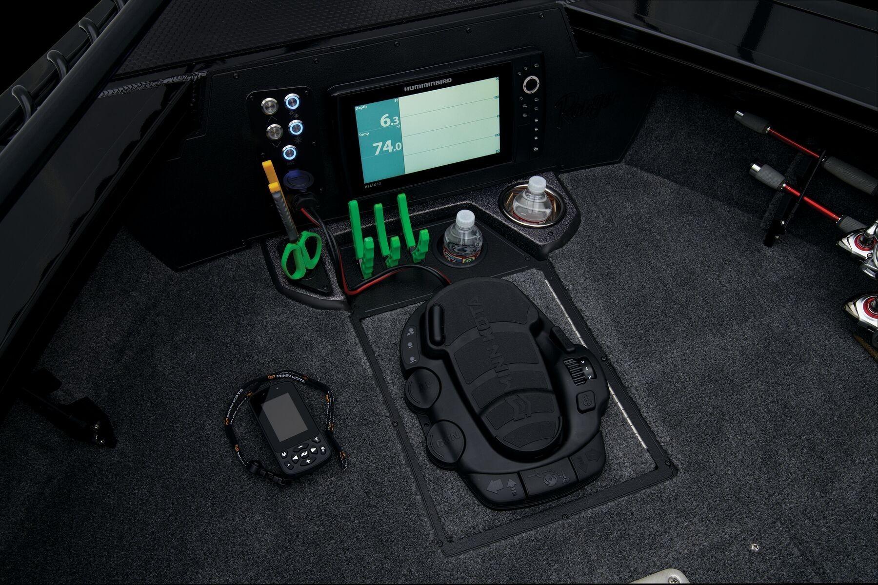 2026 Ranger VX1888 WT boat cockpit with control panel, screen, and fishing gear.