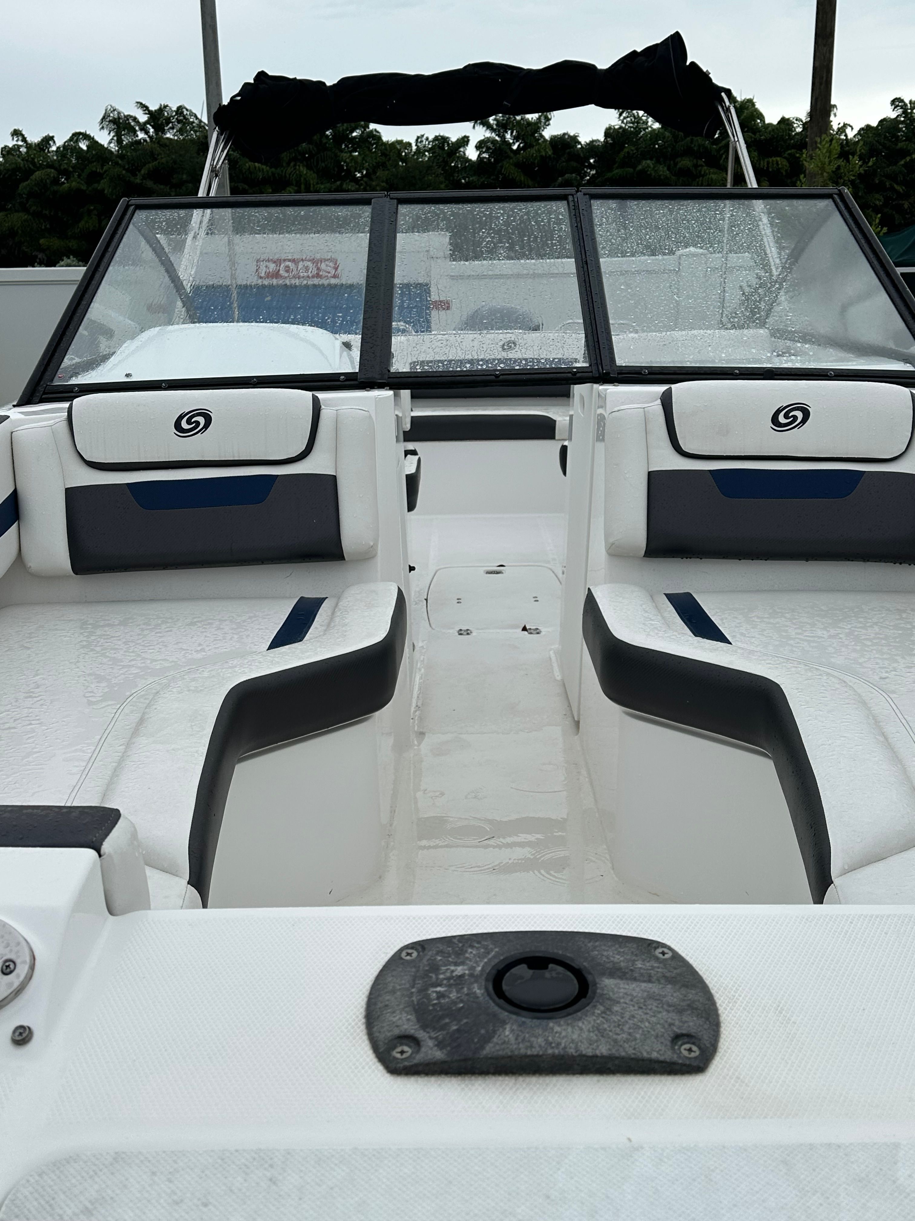 Interior view of a 2022 Hurricane 235SD boat with wet seats.