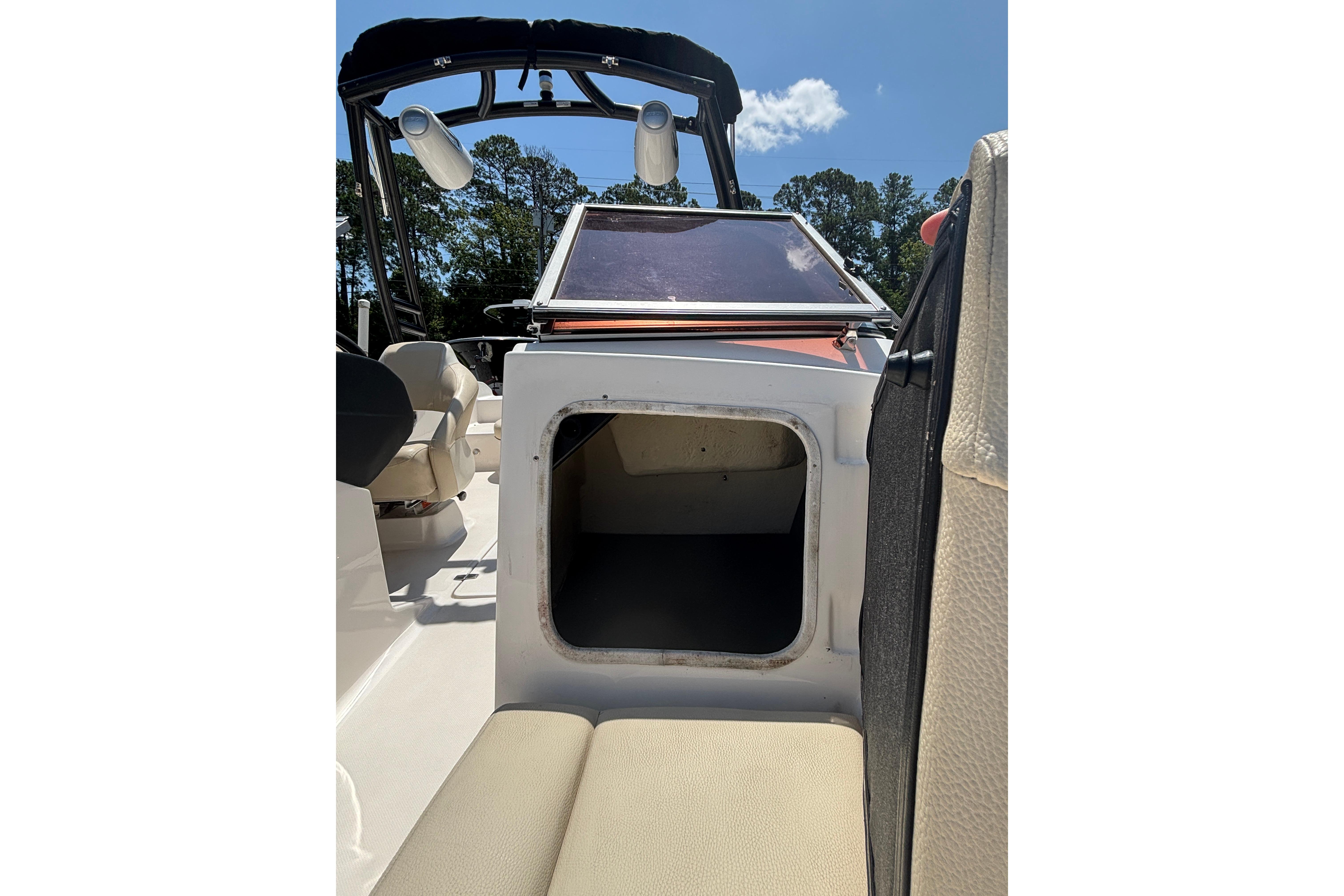2018 Regal 1900 ES Bowrider interior with open storage compartment and seating.