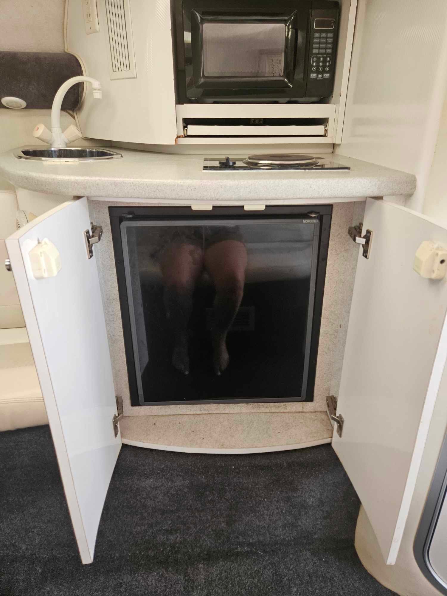 Kitchen area in a 1997 Baja 38 Special Boss boat.