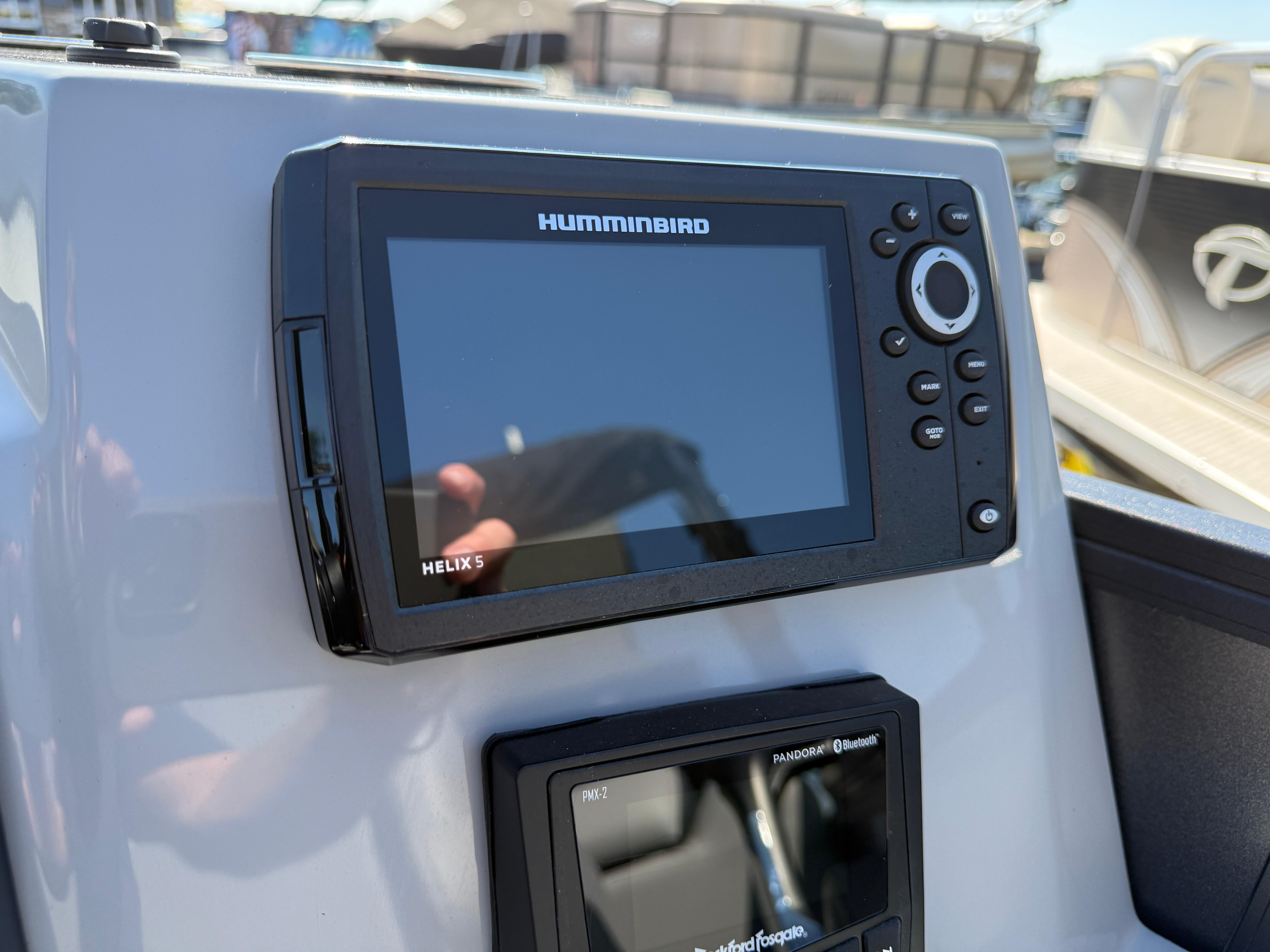 Helix 5 fish finder on 2026 Bentley Pontoons Legacy 223 Navigator dashboard.
