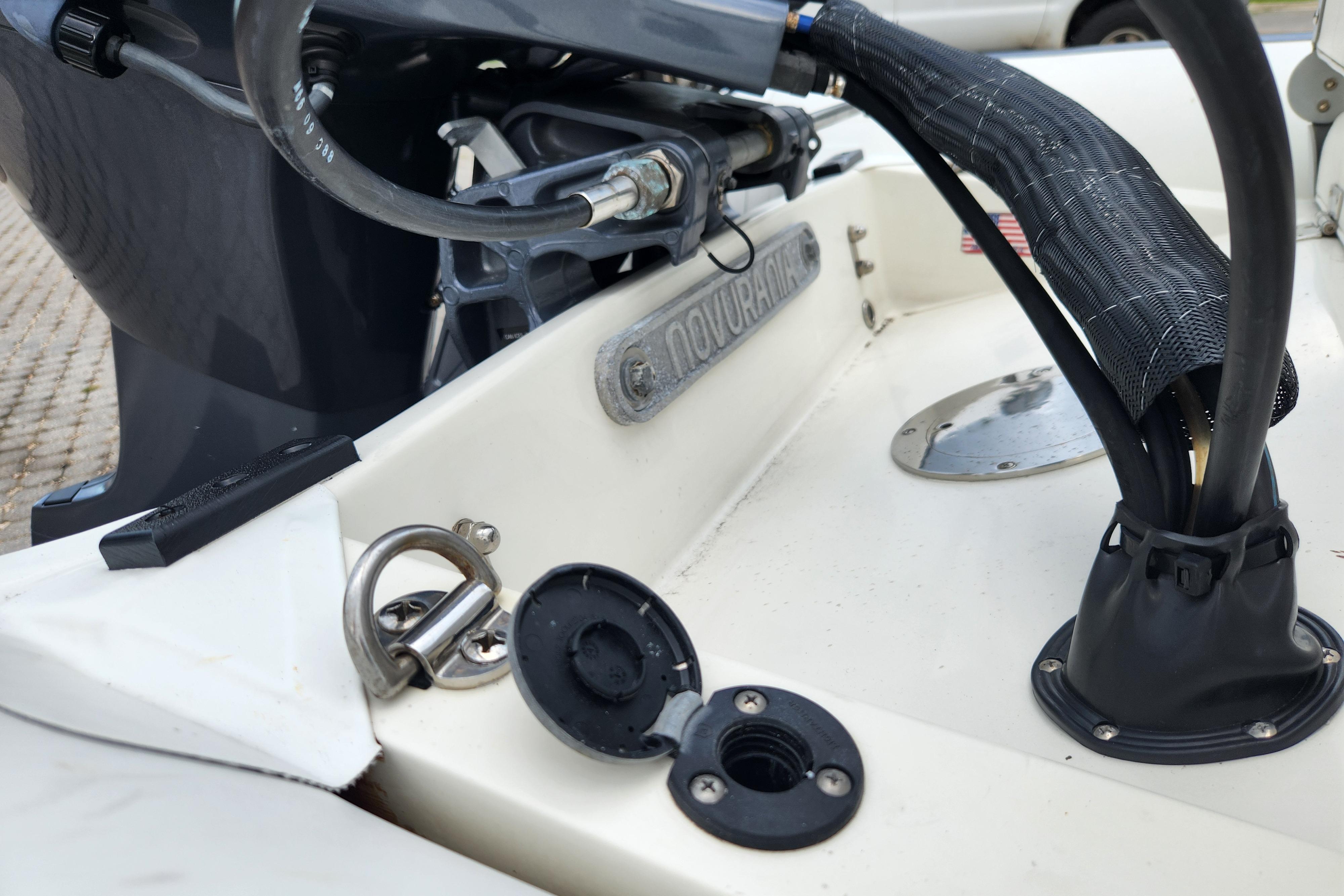 2019 Novurania DL 400 boat engine compartment with cables and fittings.