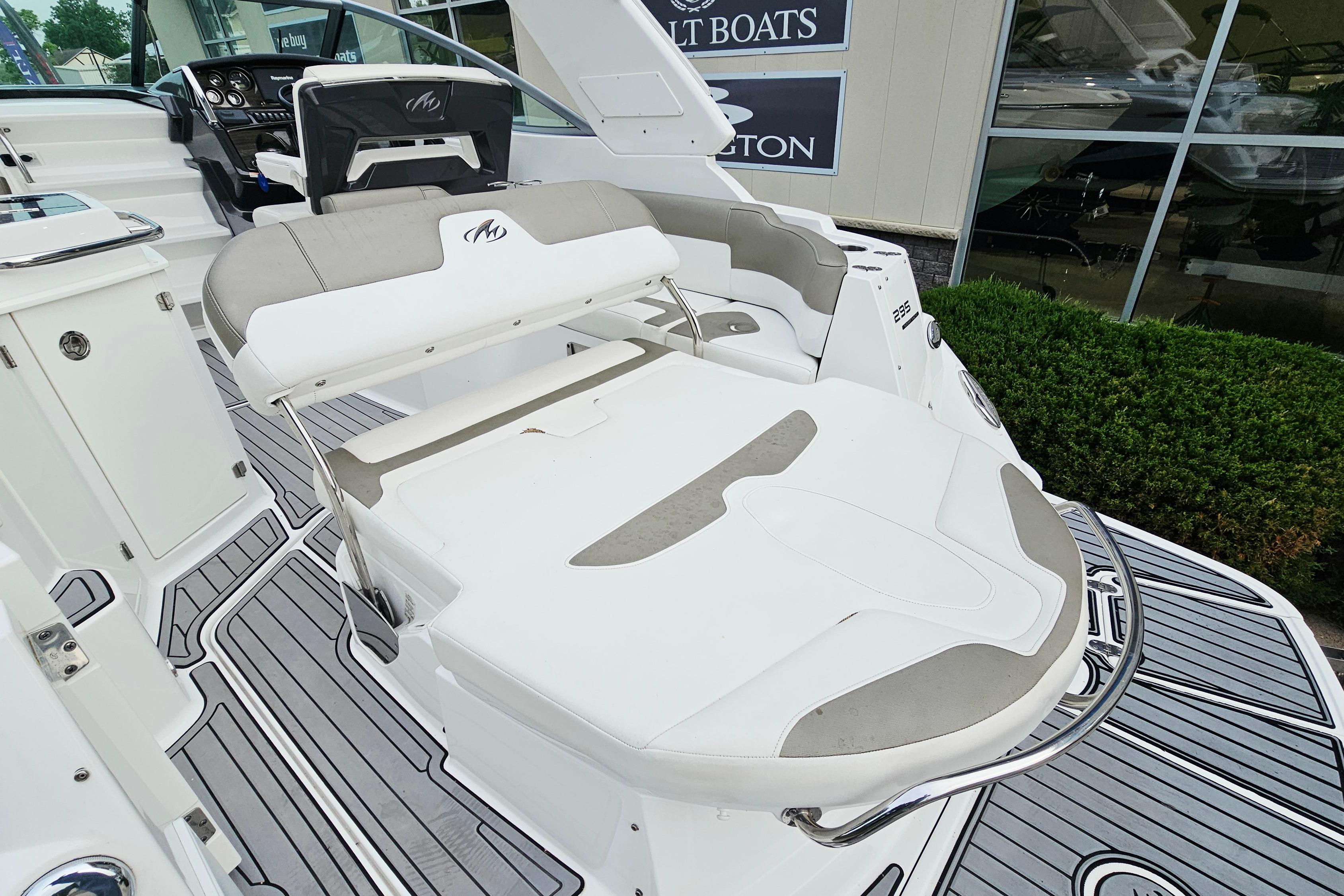 2016 Monterey 295 Sport Yacht interior with sleek seating and modern dashboard design.