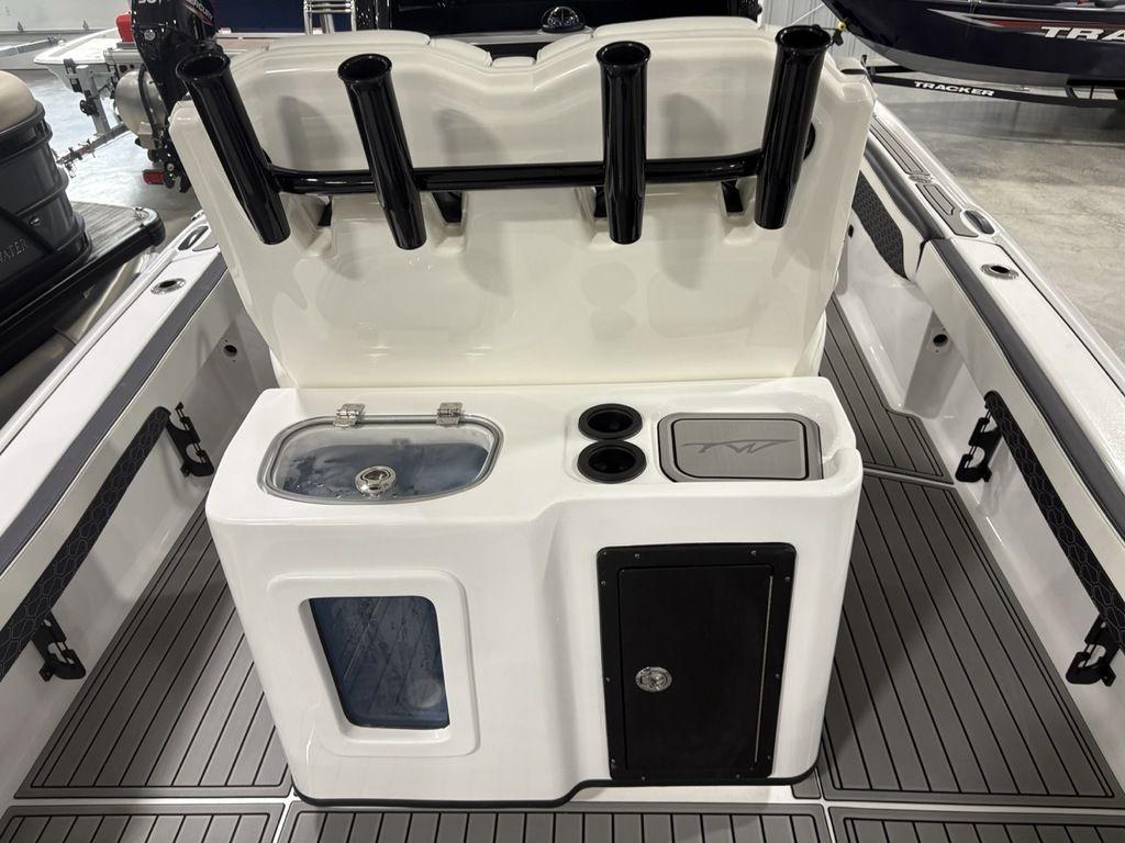2026 Tidewater 2700 CB boat interior with rod holders and storage compartments.