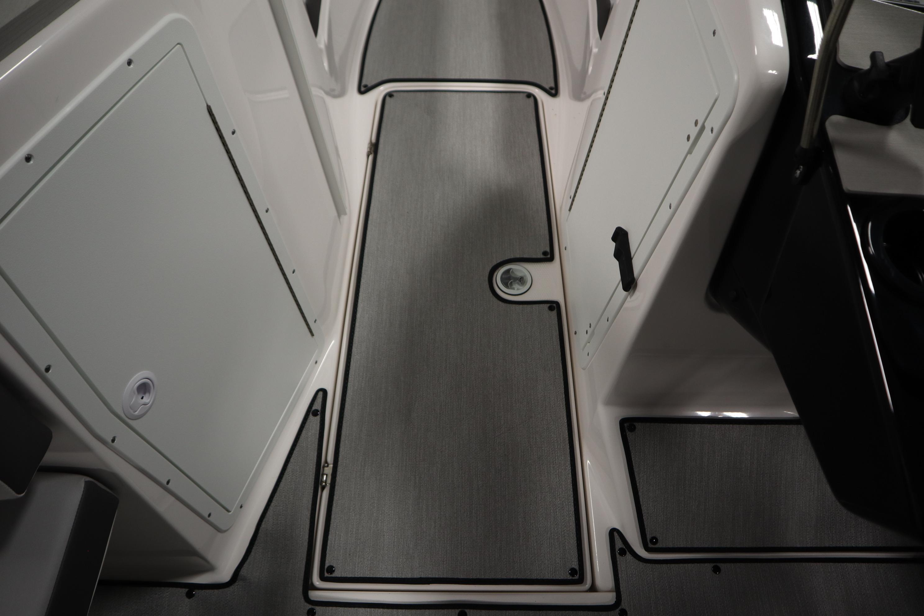 2026 Yamaha Boats AR220 interior flooring and storage compartments.