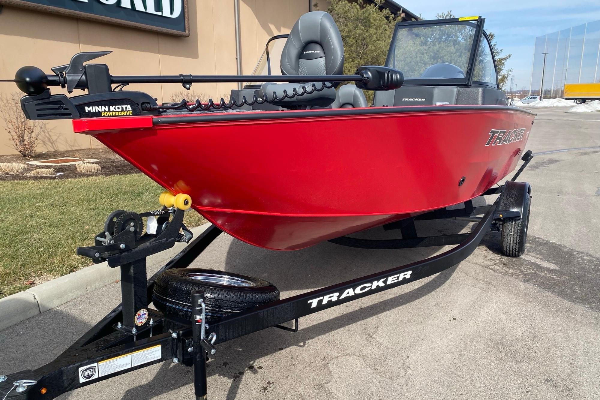 2026 Tracker Pro Guide V-175 Combo boat in vibrant red on a trailer.