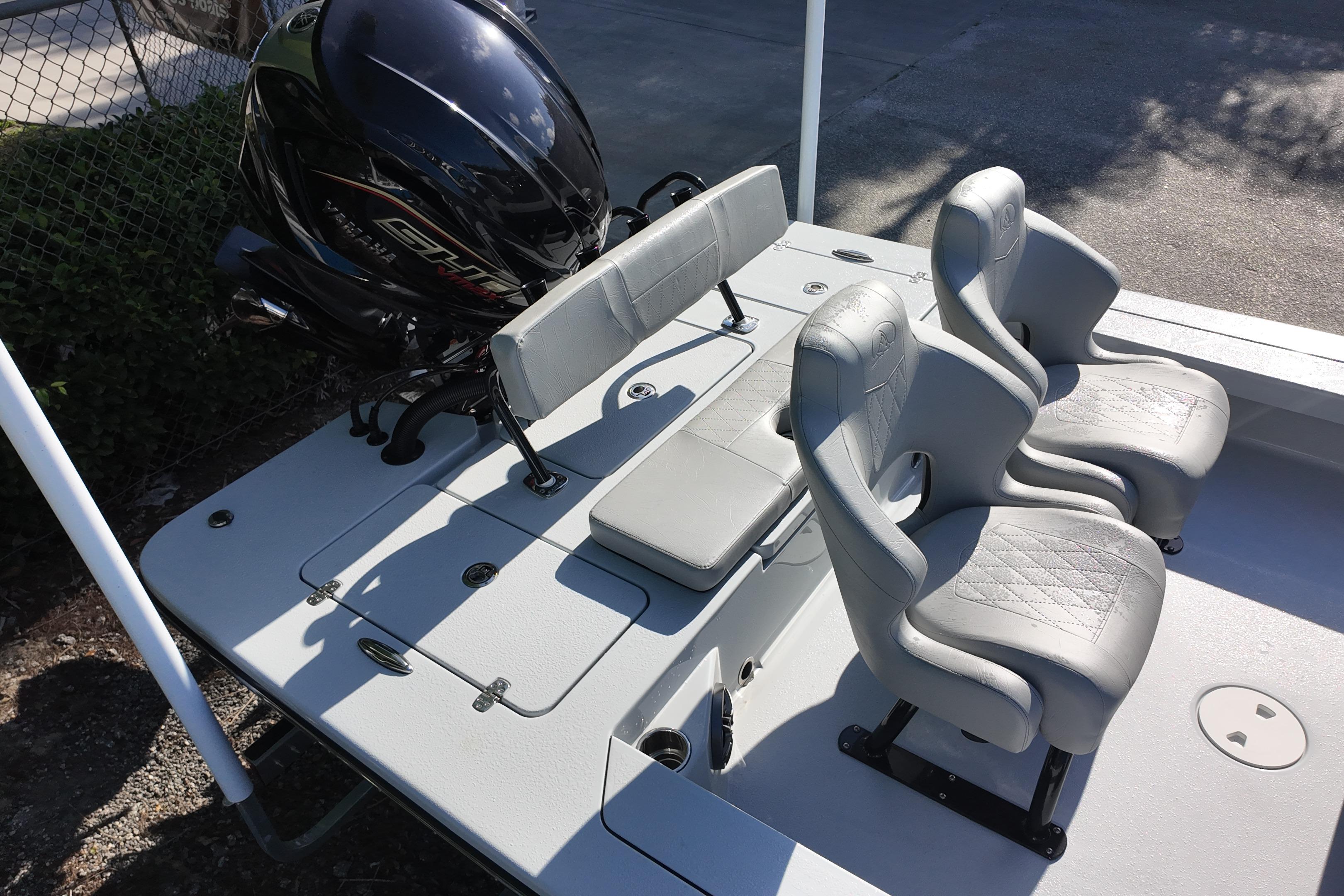 2026 Blazer Bay 675 Ultimate Bay boat with dual seats and powerful outboard motor.