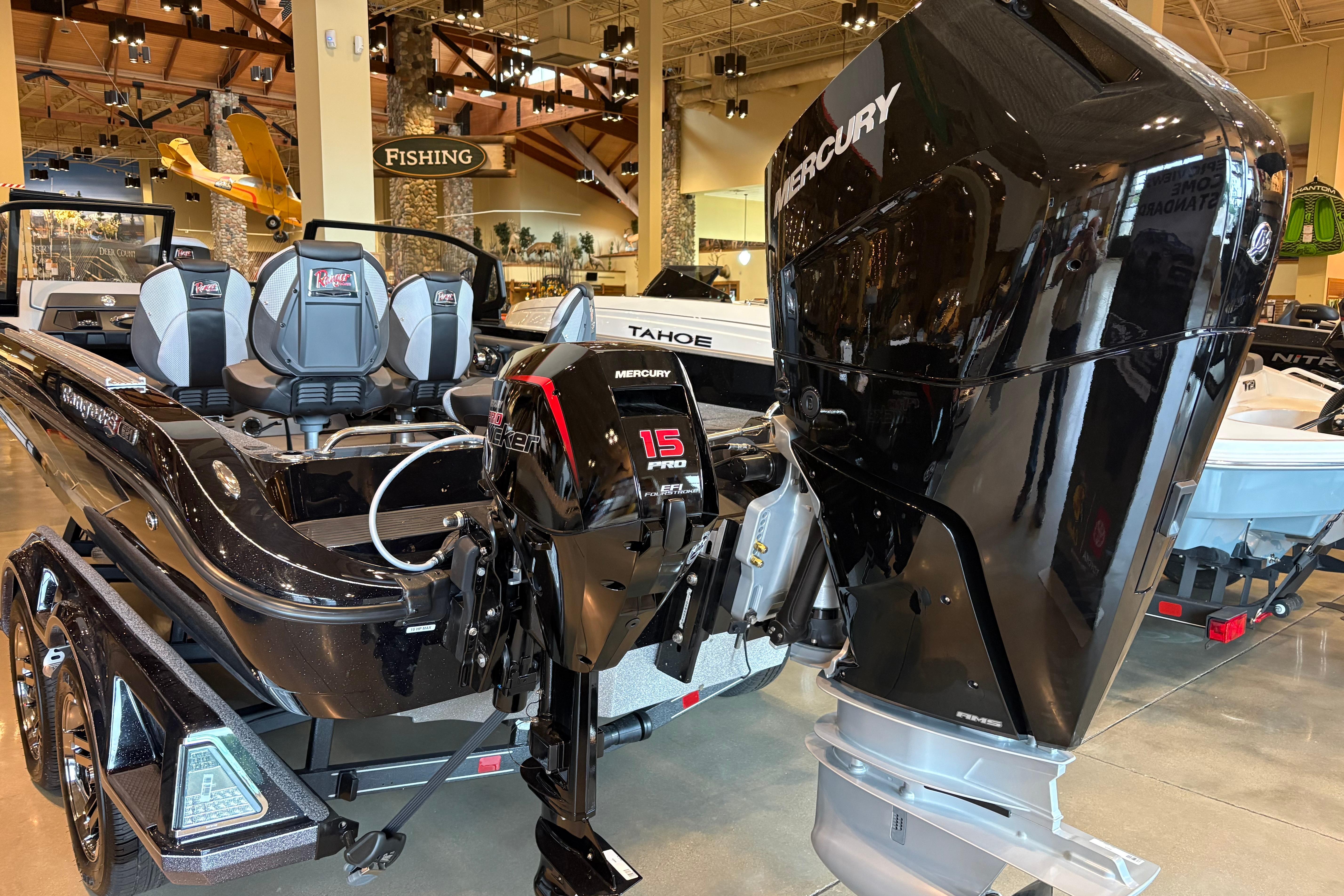 2026 Ranger 621FS Cup-Equipped boat with Mercury 15 Pro XS engine in showroom.
