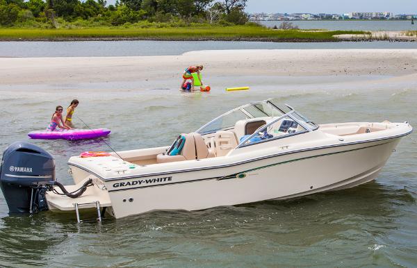 Manufacturer Provided Image: 2015 Grady-White Freedom 225 boat anchored near a sandy beach with children playing.