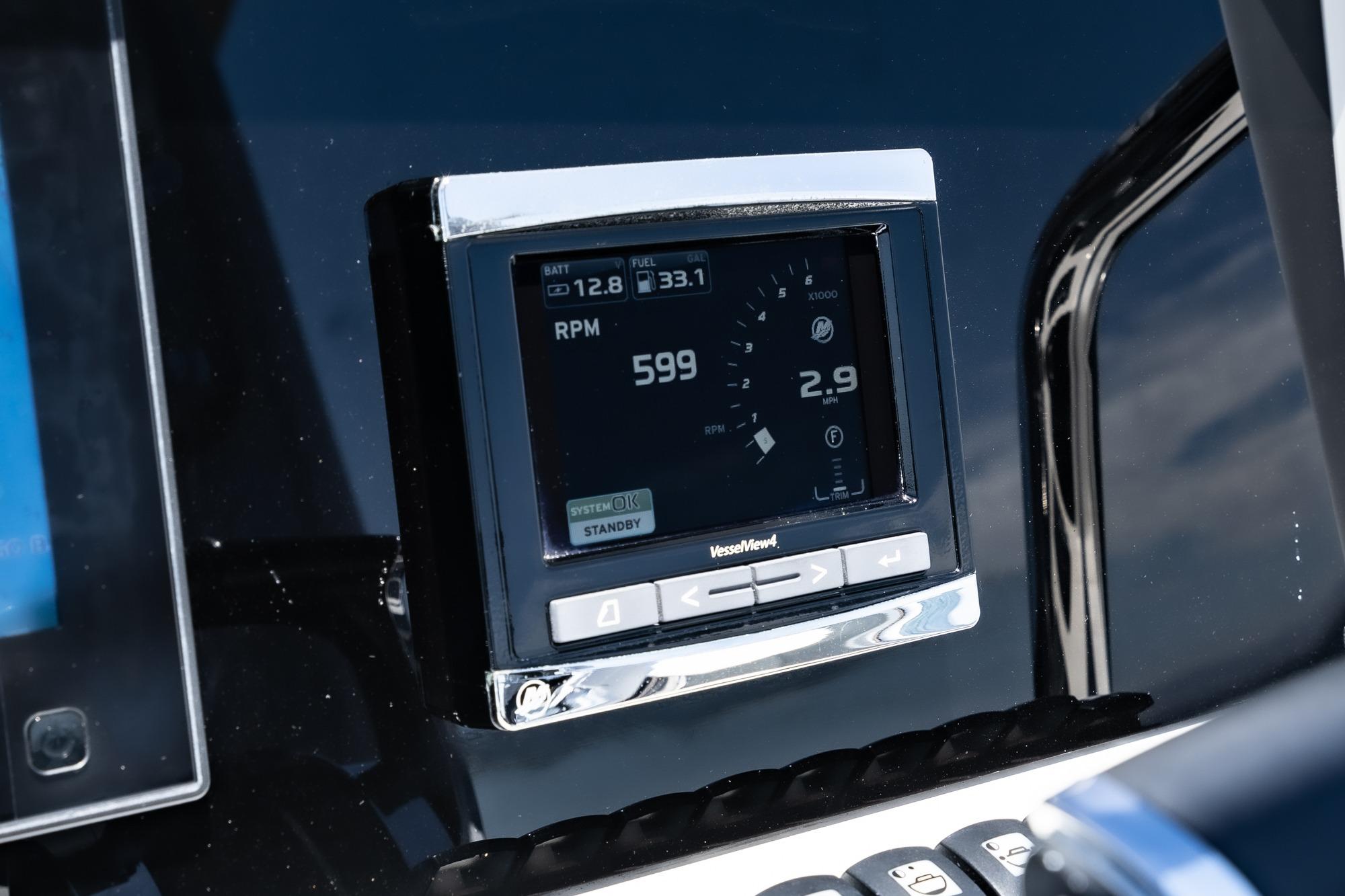 Close-up of 2018 Fjord 36 Xpress digital dashboard display showing RPM and fuel data.