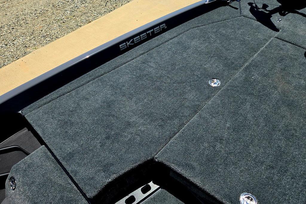 2026 Skeeter ZXE20 boat deck with gray carpet and storage compartments.