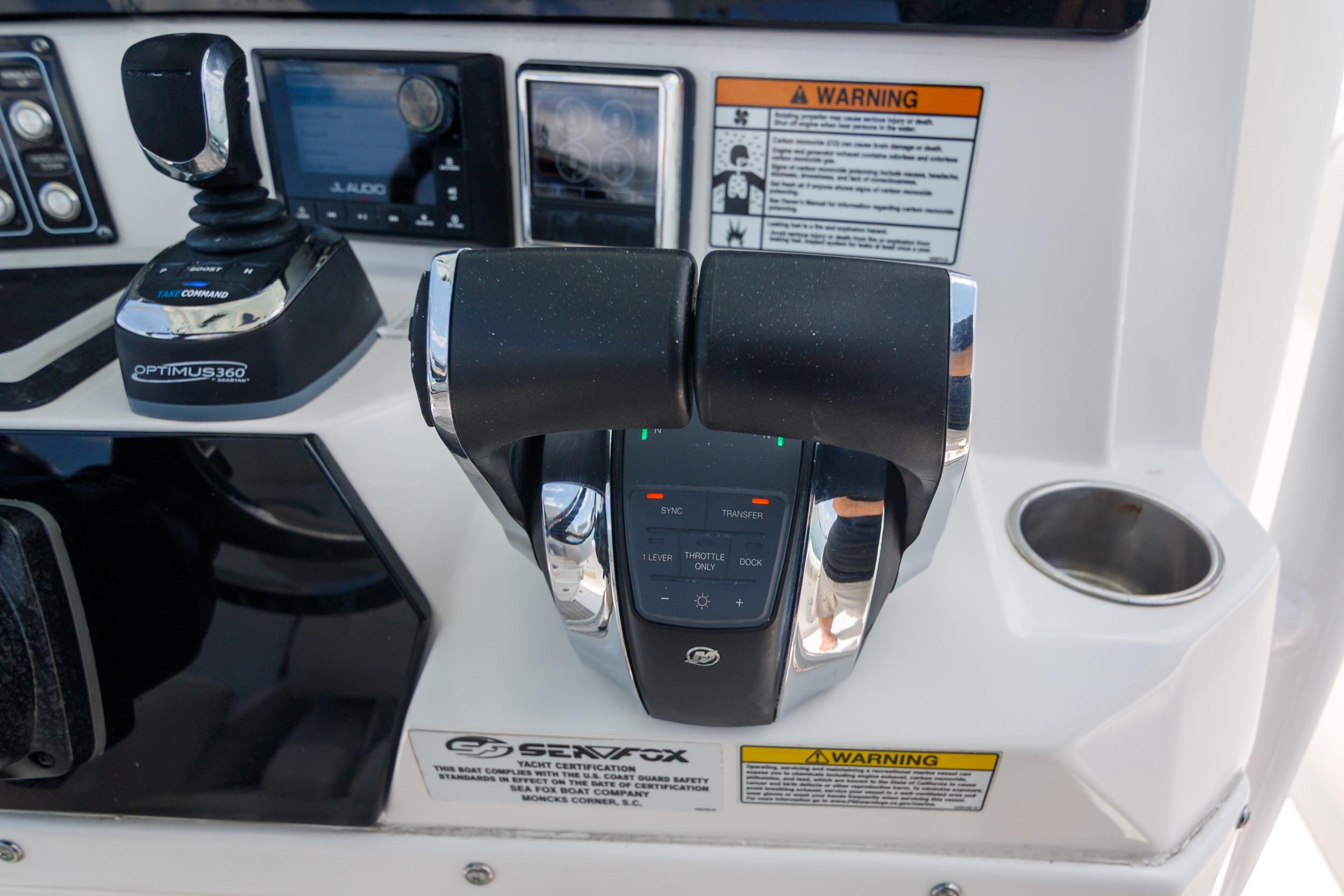 Control panel of 2021 Sea Fox 328 Commander boat with joystick and throttle.