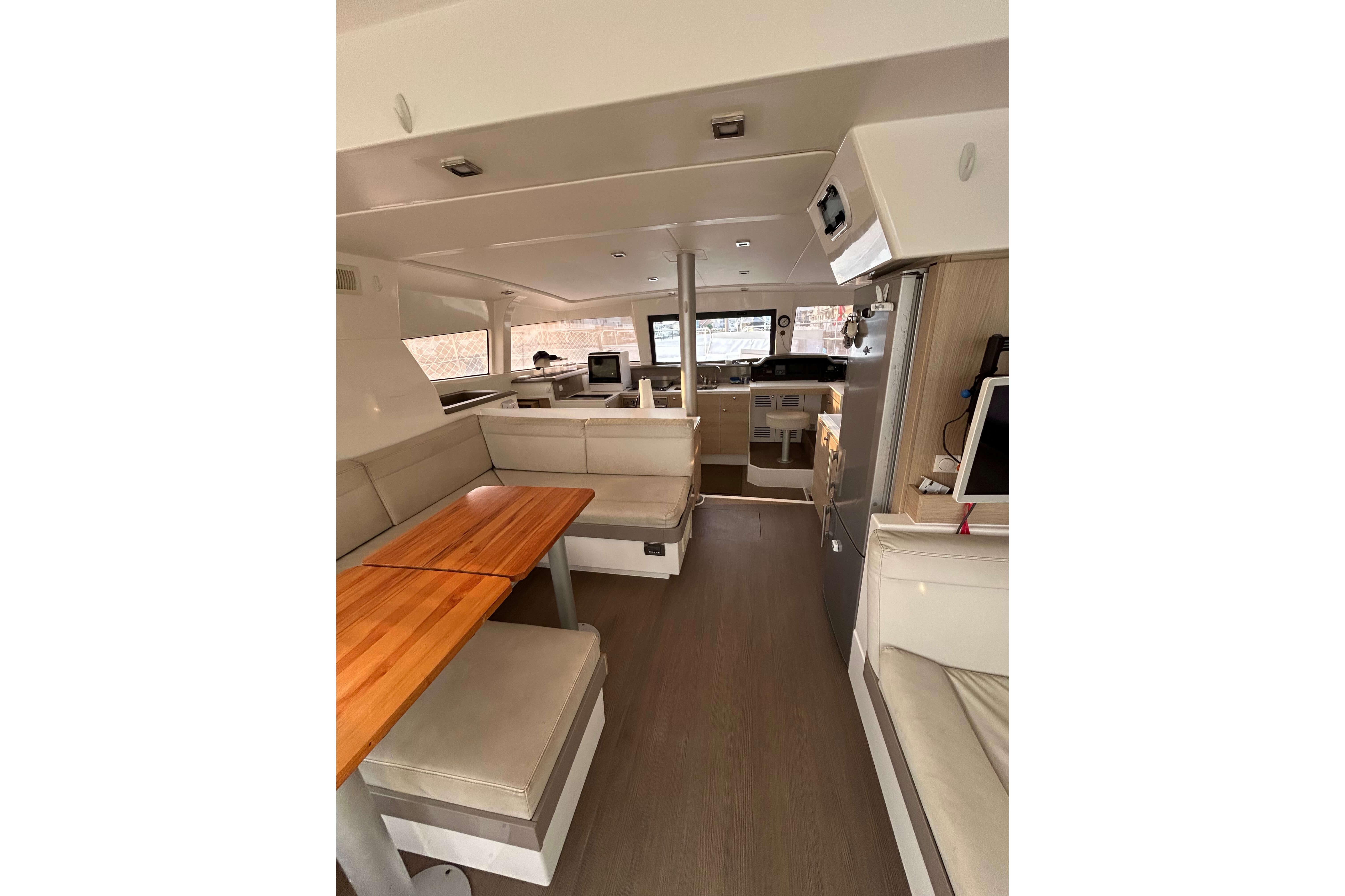 Interior of 2018 Bali 4.1 yacht with modern seating and dining area.