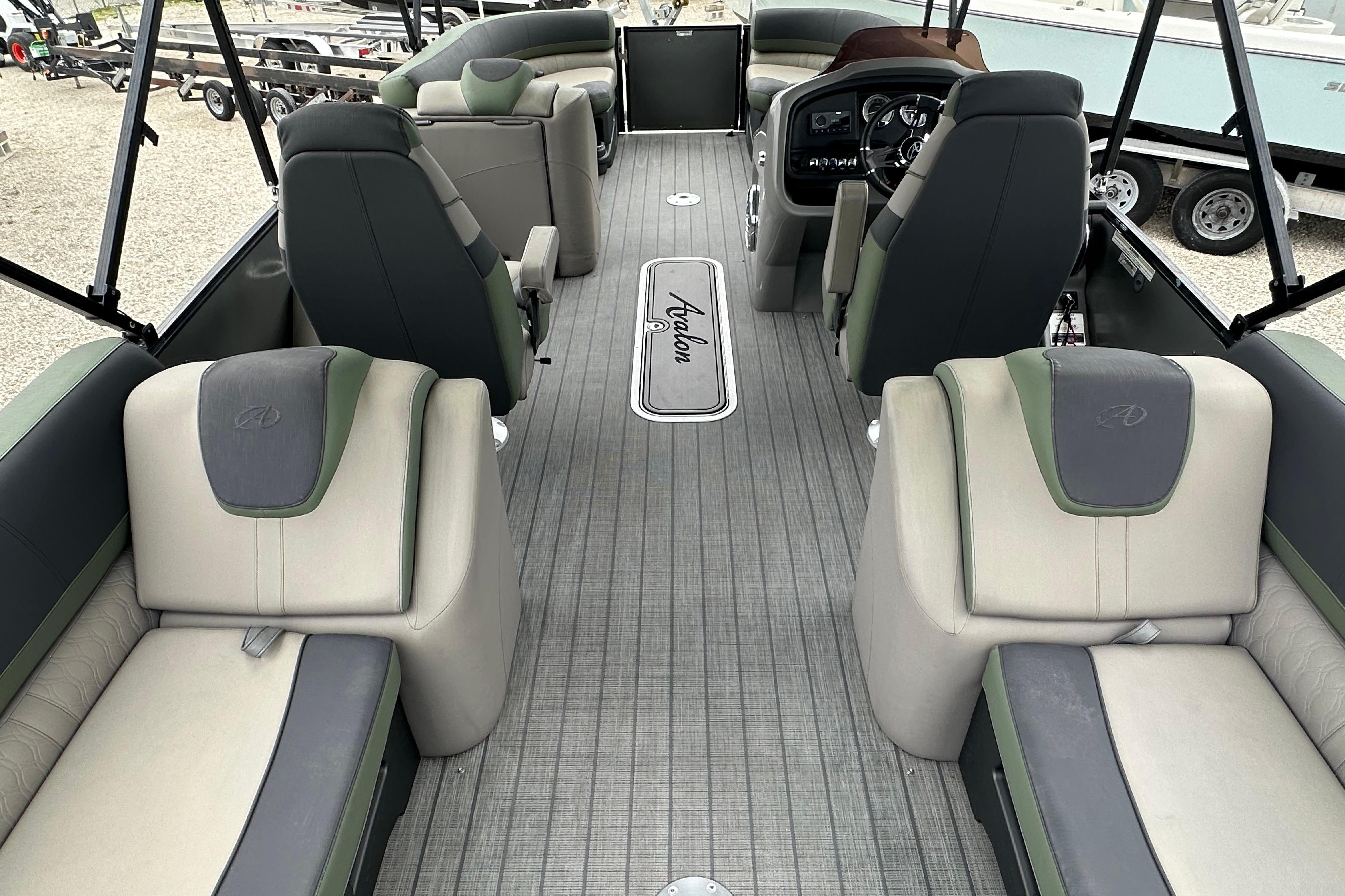 2023 Avalon Catalina Quad Lounge interior with plush seating and modern dashboard.