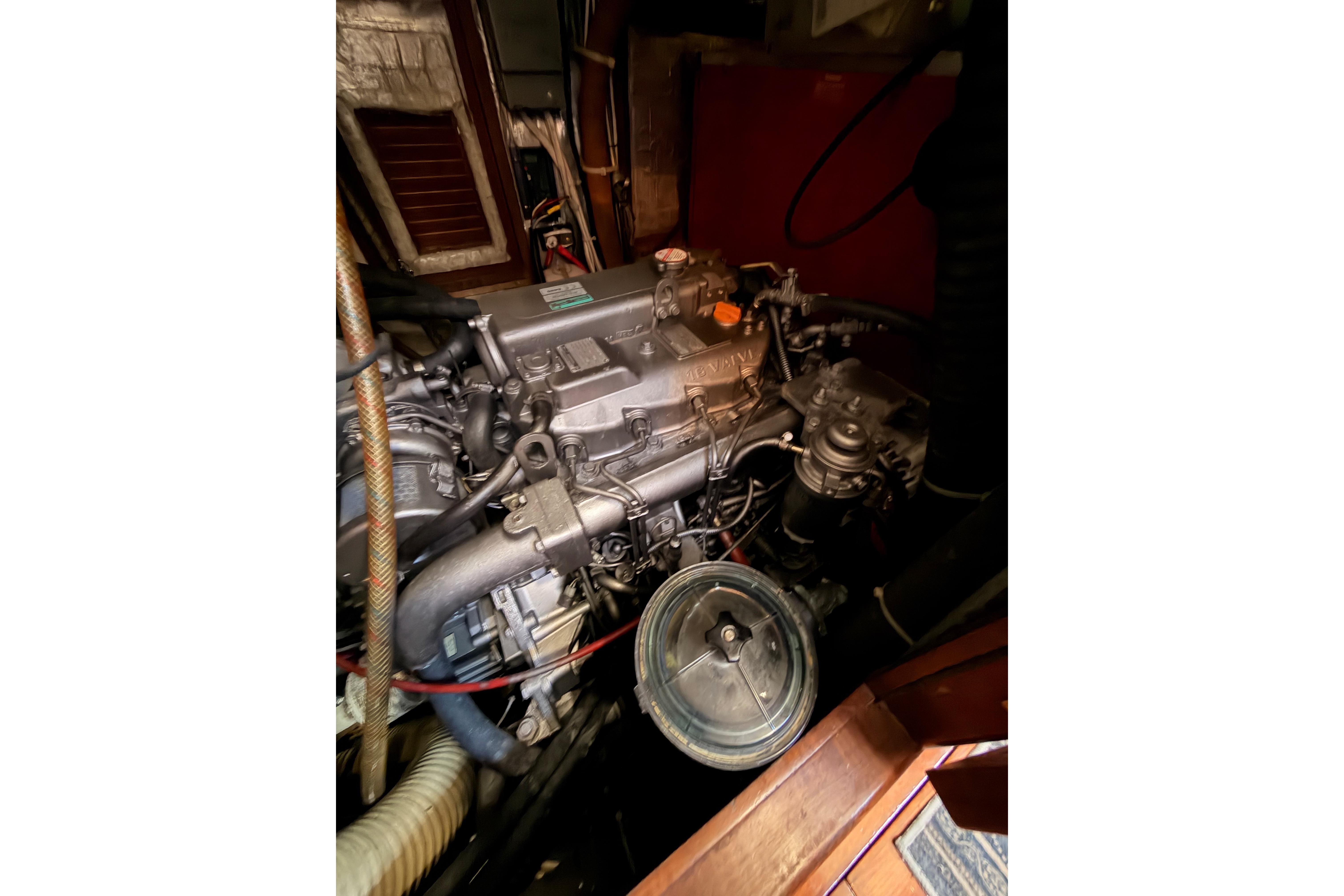 Engine compartment of a 1991 Hylas 51 yacht, showcasing detailed mechanical components.